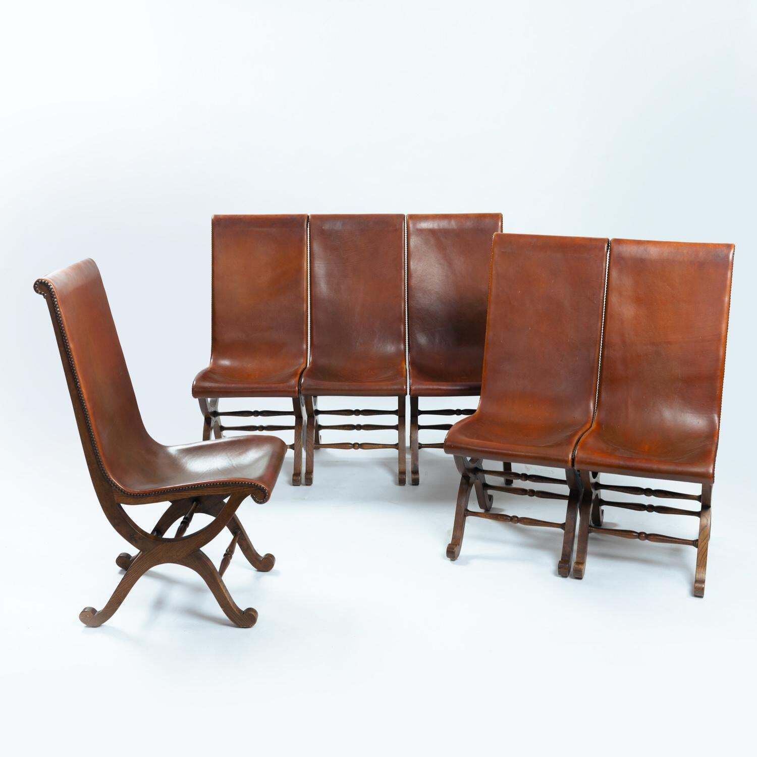 photo furniture Pierre Lottier Brown Spanish Slipper Chairs By Almazan, 1950s