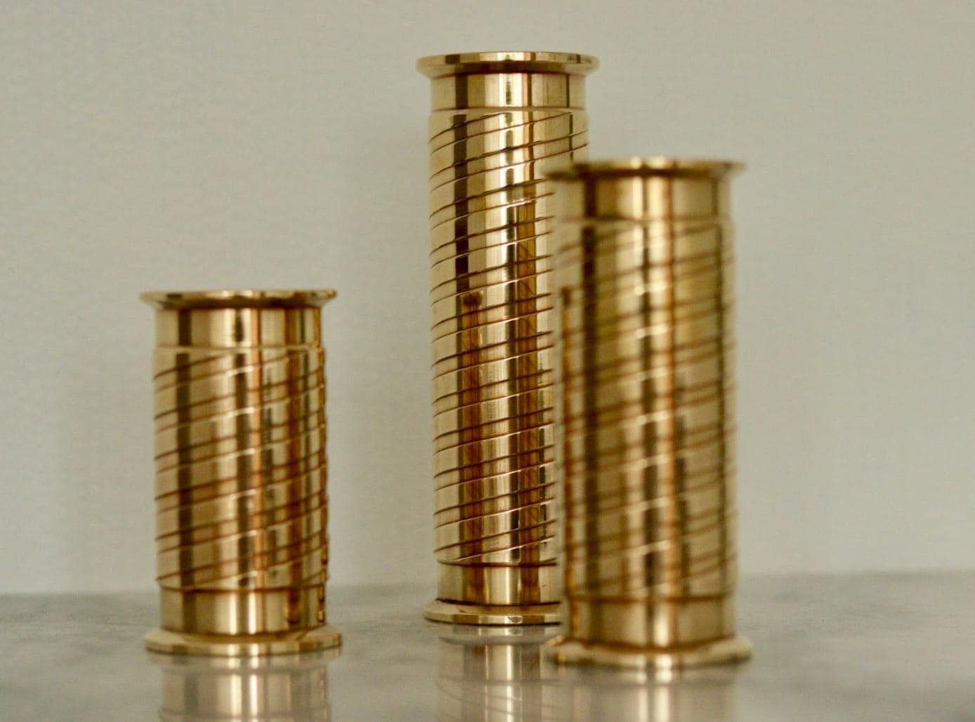 Trio Of Mid Century Swedish Brass Candle Holders photo for sale