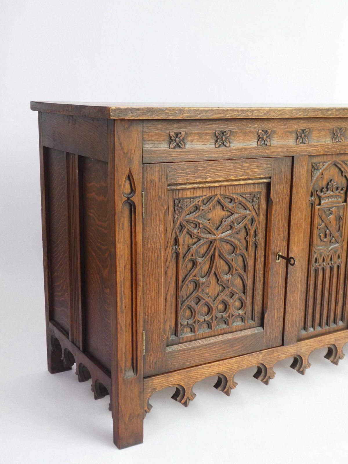 Antique Gothic Wooden Credenza, Hand Carved Cabinet With Doors And Lock, 19th Century Medieval Cupboard With Lion And Church Window Panels photo vinterior