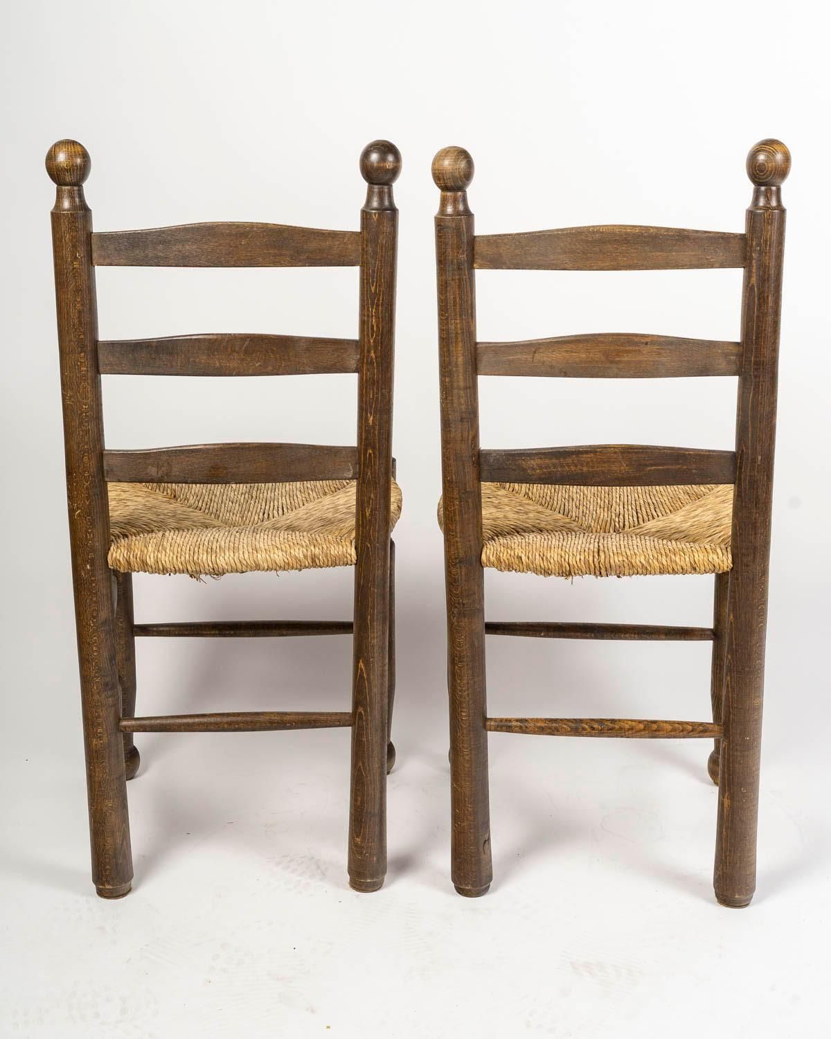 photo vintage Set Of Six Charles Dudouyt Dining Chairs In Wood And Cane, 20th Century.