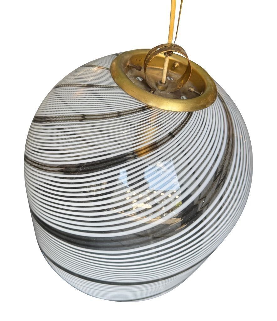 An Italian 1970s Large Murano Swirl Glass Pendant Light By Venini With Brass Top And Ceiling Rose. photo for sale