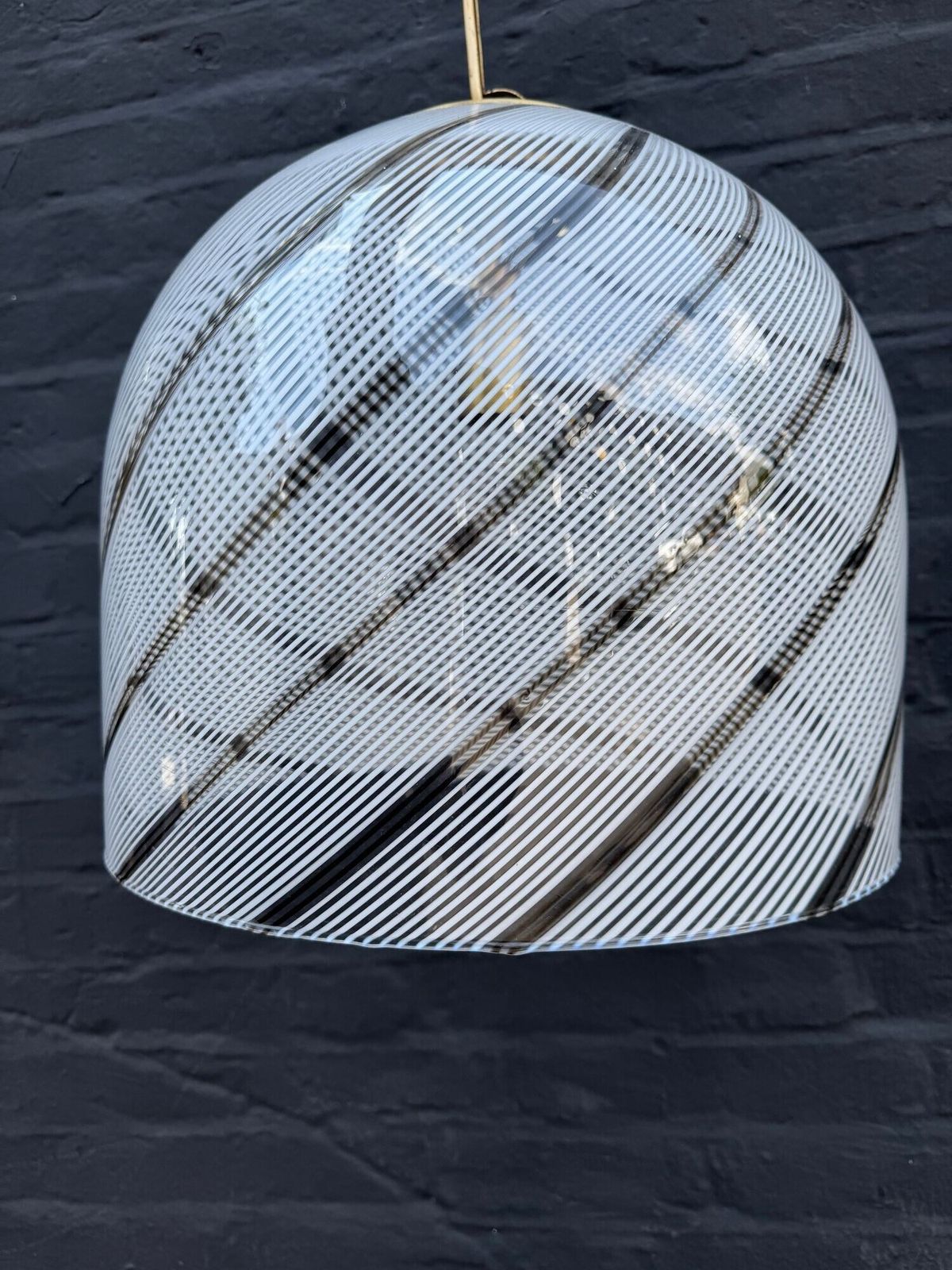 photo furniture An Italian 1970s Large Murano Swirl Glass Pendant Light By Venini With Brass Top And Ceiling Rose.