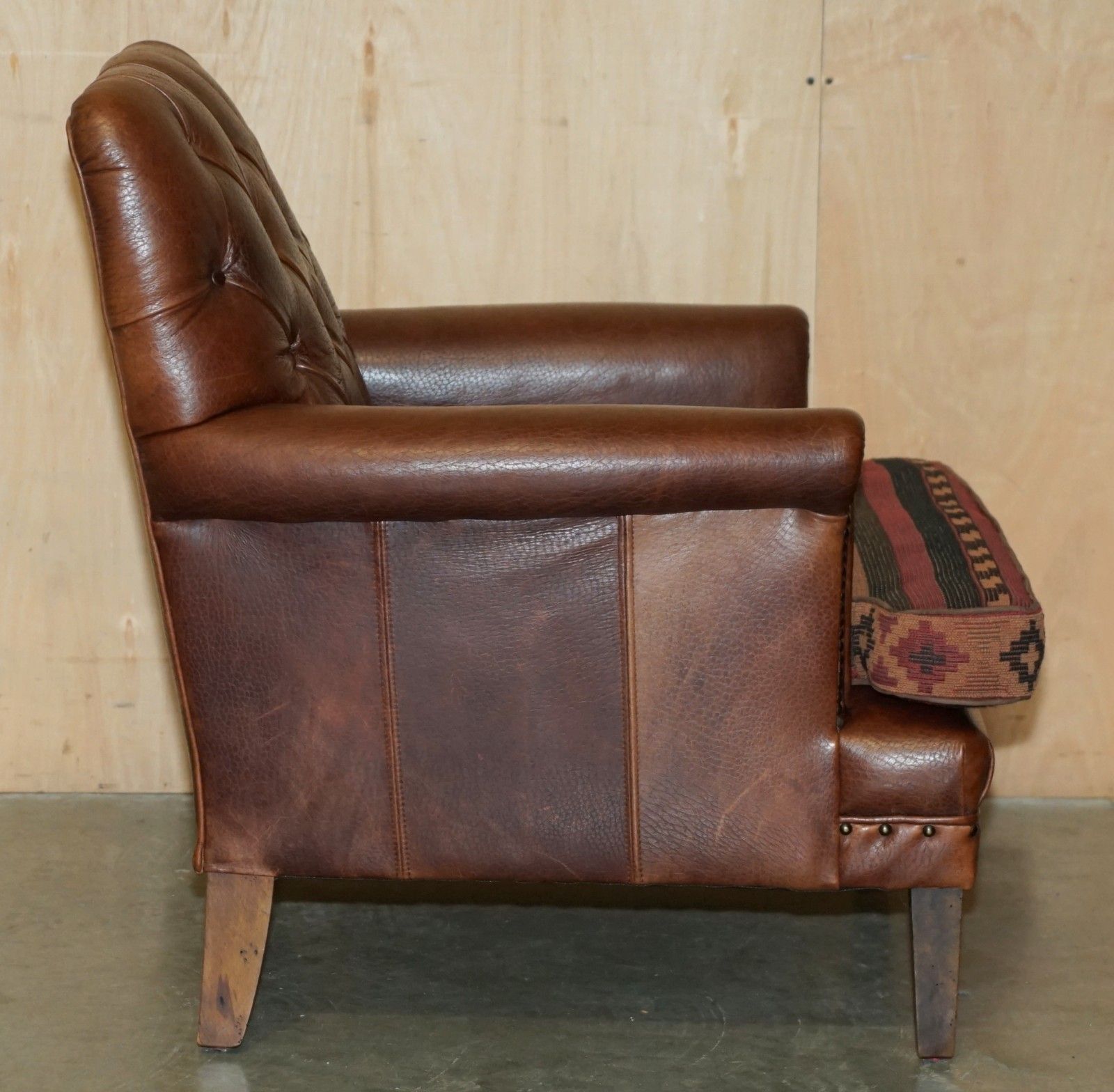 Furniture Lovely Brown Leather Chesterfield Tufted Kilim Upholstered Library Armchair photo