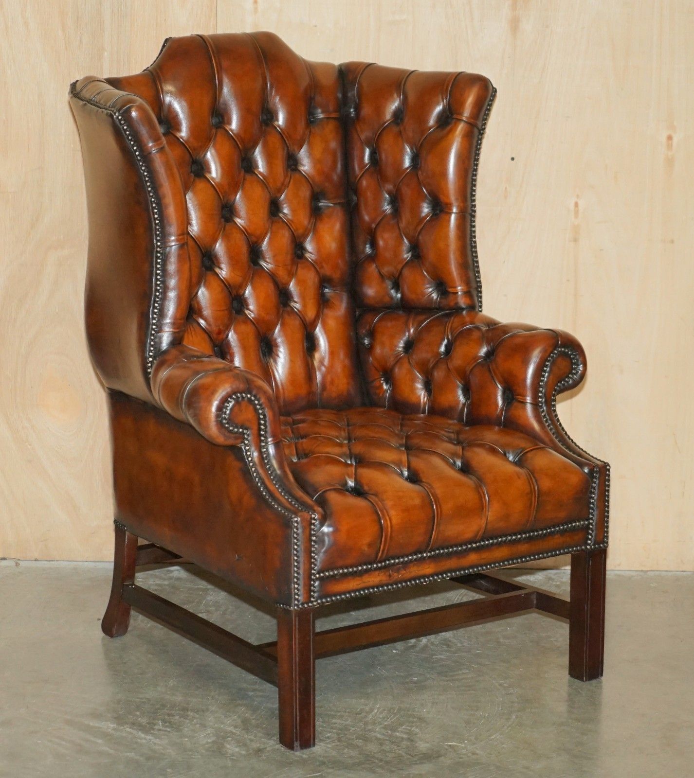 Pair Of Restored Georgian H Framed Chesterfield All Tufted Wingback Armchairs photo for sale