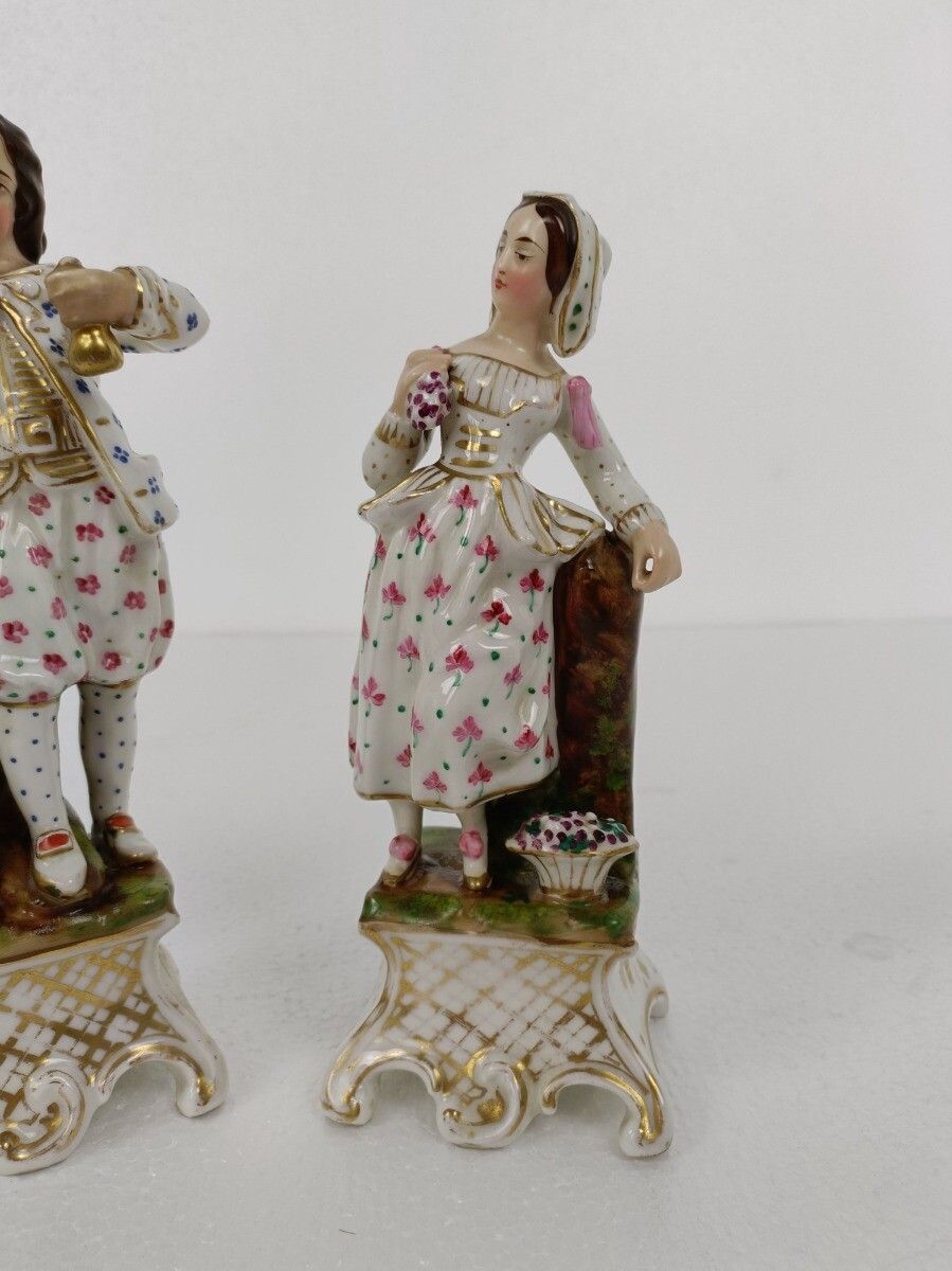 Pair Of Figurines Statues Bisque Porcelain  Man And Woman Flower Spanish Couple photo for sale