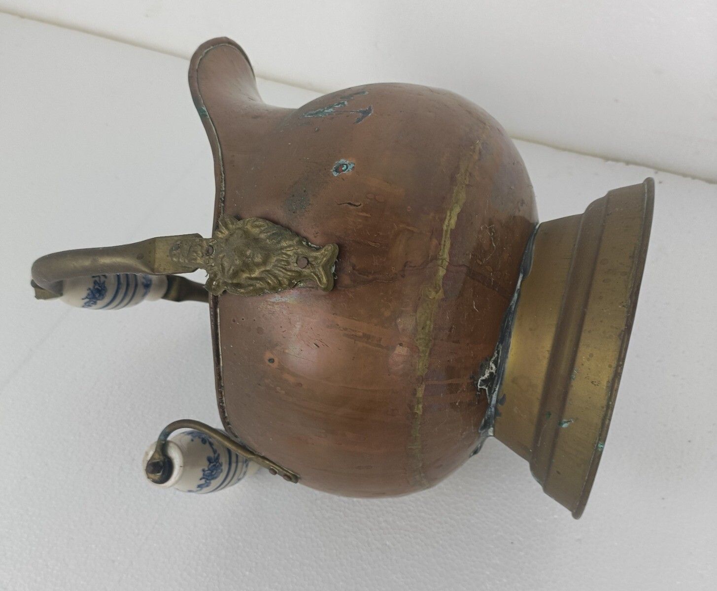 Antique Hammered Brass Kettle Bowl With Delft Blue White Porcelain Handles Plant photo vintage
