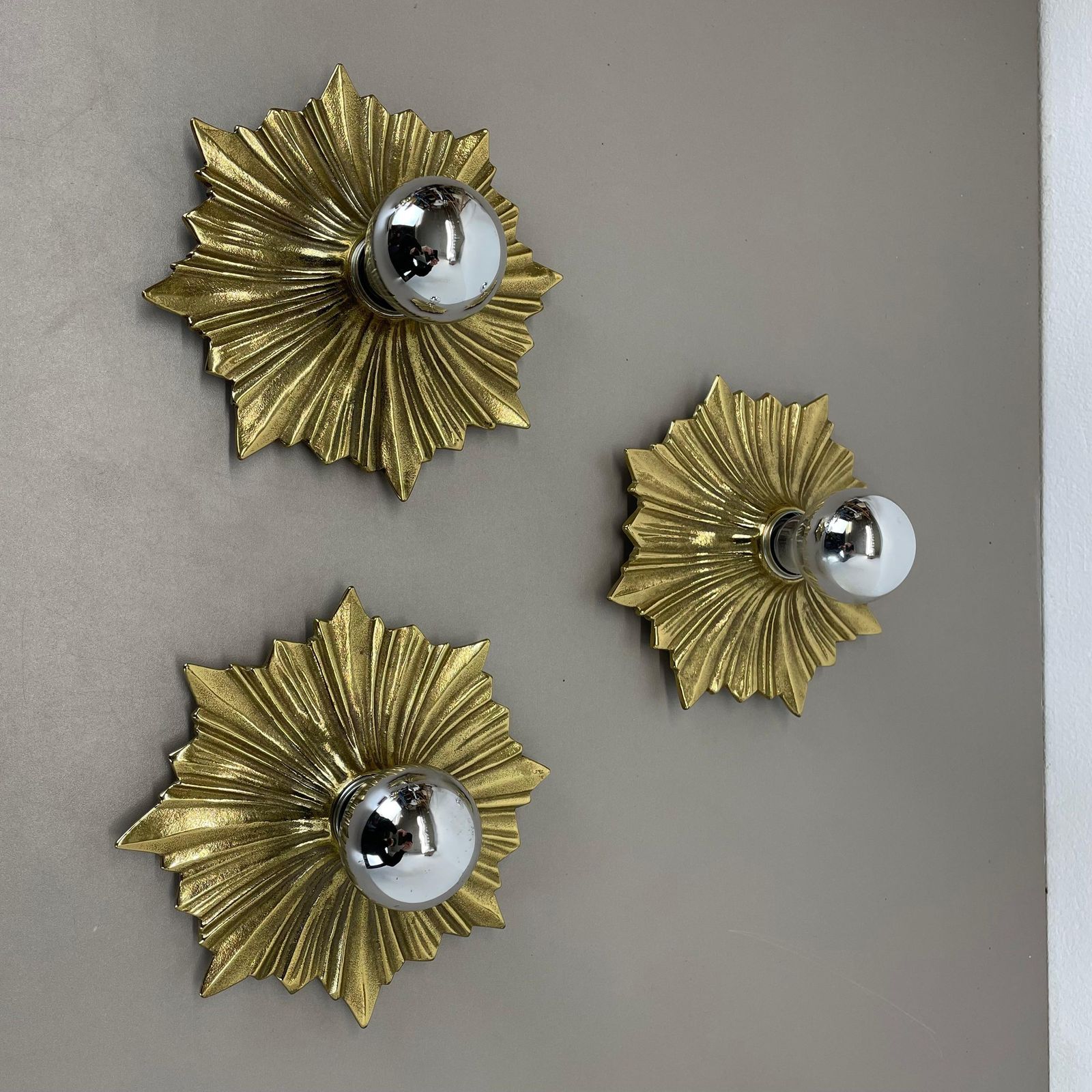 Set Of Three Brutalist Bronze Sunburst Wall Ceiling Light Sconces, Italy 1950s photo furniture