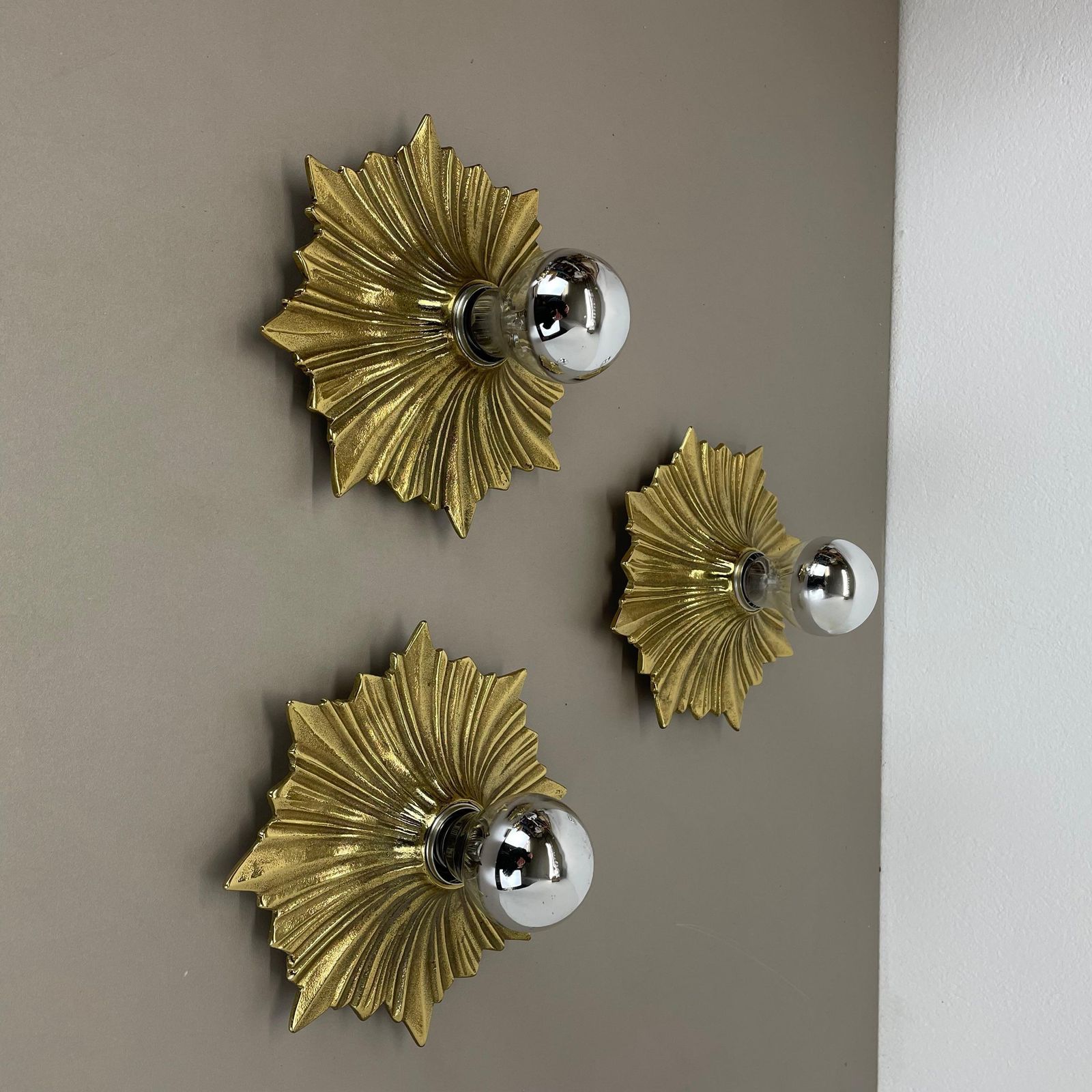 Set Of Three Brutalist Bronze Sunburst Wall Ceiling Light Sconces, Italy 1950s photo for sale