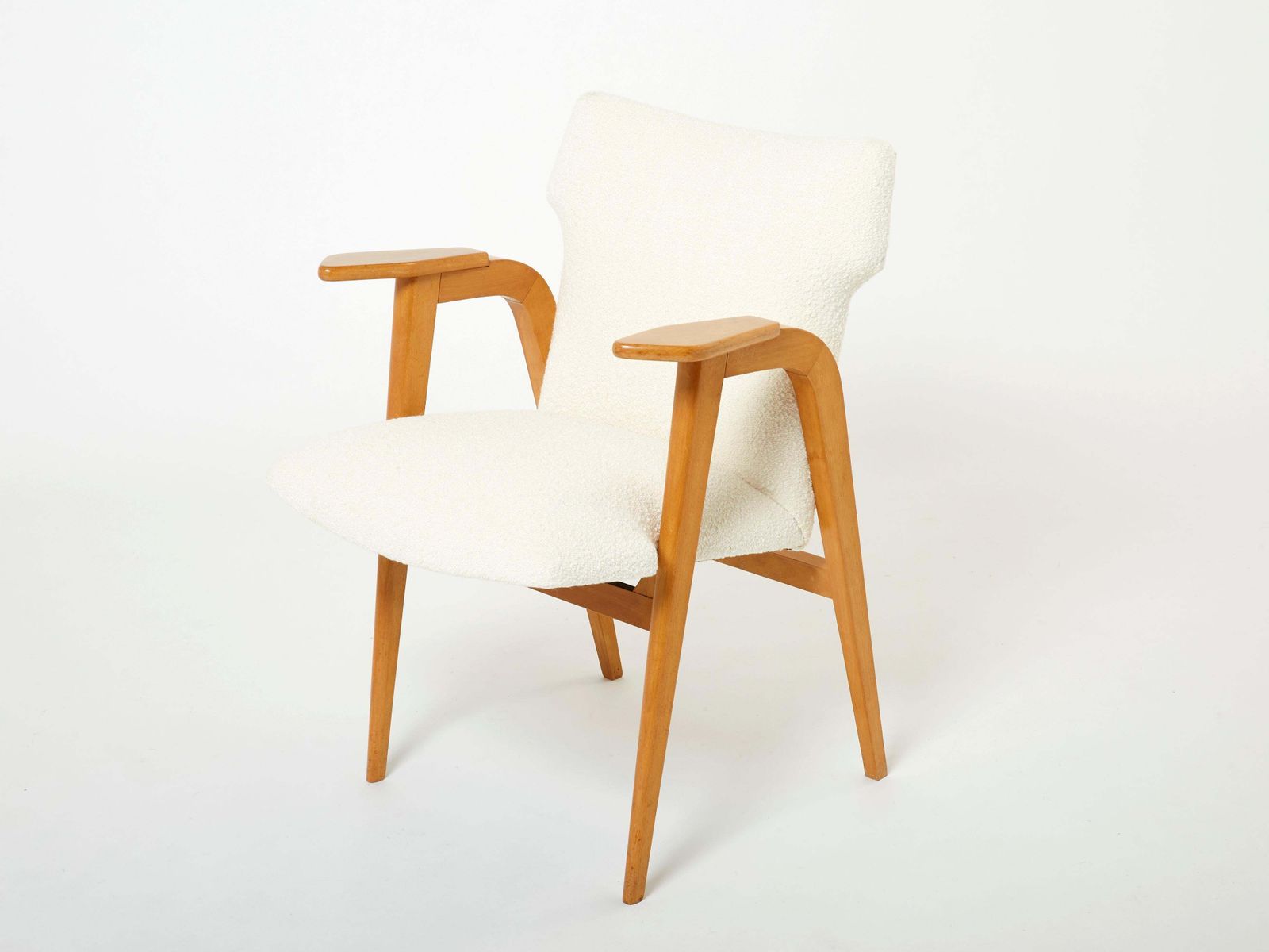 photo for sale Fauteuils à pieds compas en chêne massif et bouclé de laine, par Roger Landault, années 1950