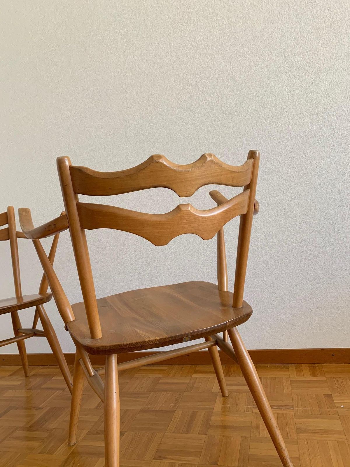 photo furniture Elegant Pair Of Elm And Beech Easy Chairs By Ercol, Uk, 1950s. Model 493.