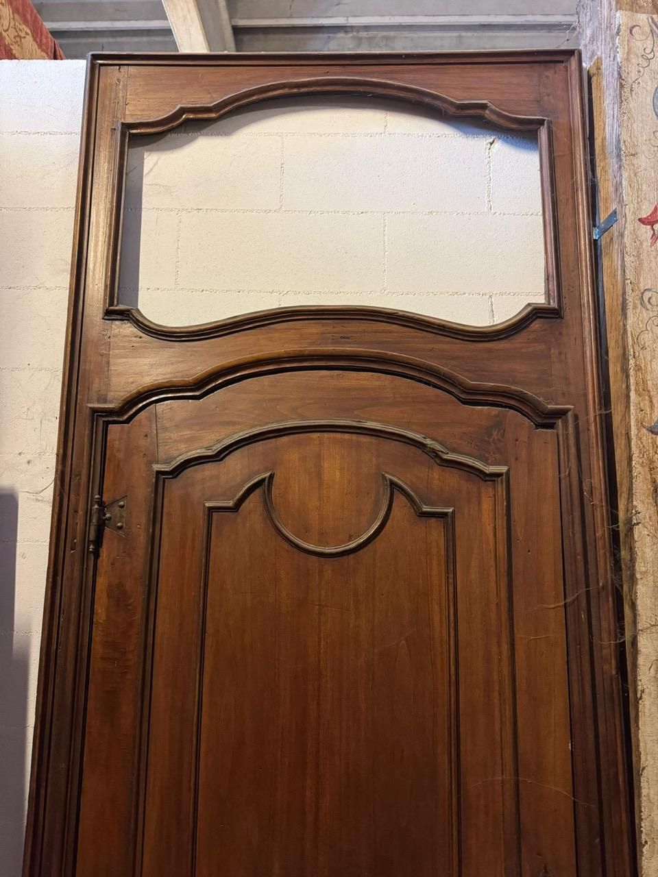 Carved Walnut Door With A Tall Frame And Space For An Overdoor, Italy photo for sale