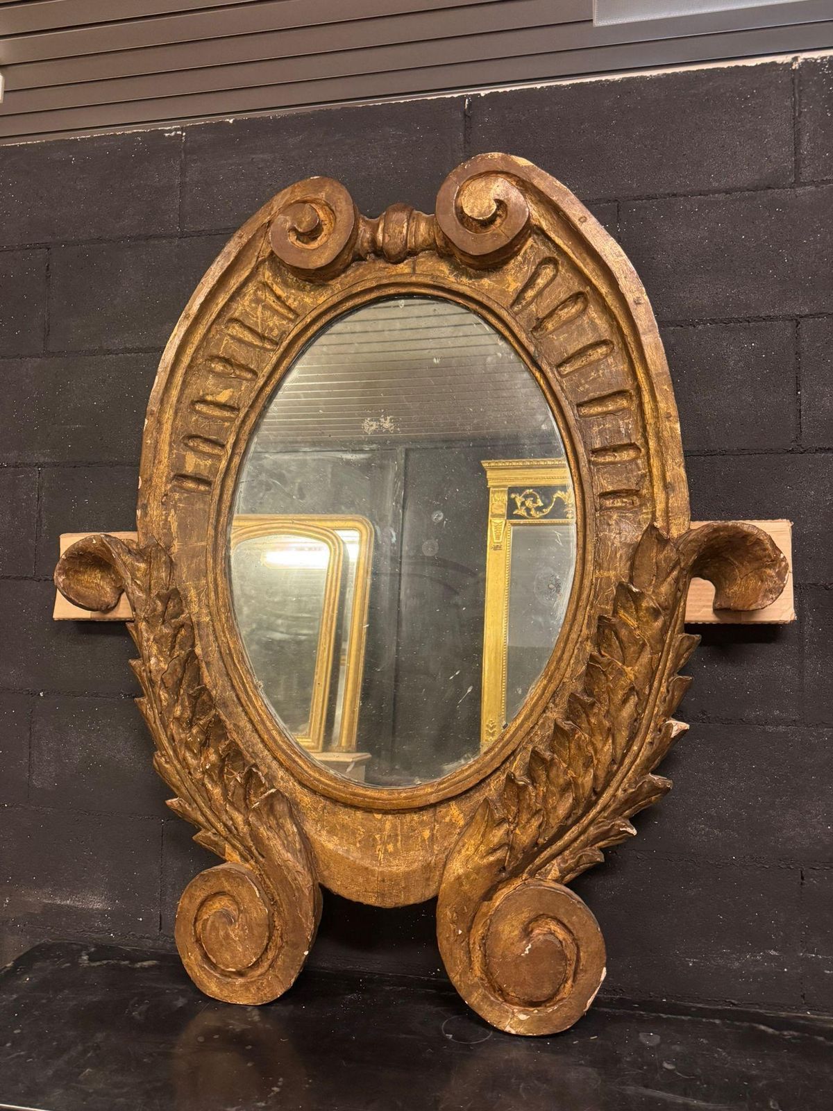 photo furniture Oval Wall Mirror In Carved And Gilded Wood, Italy