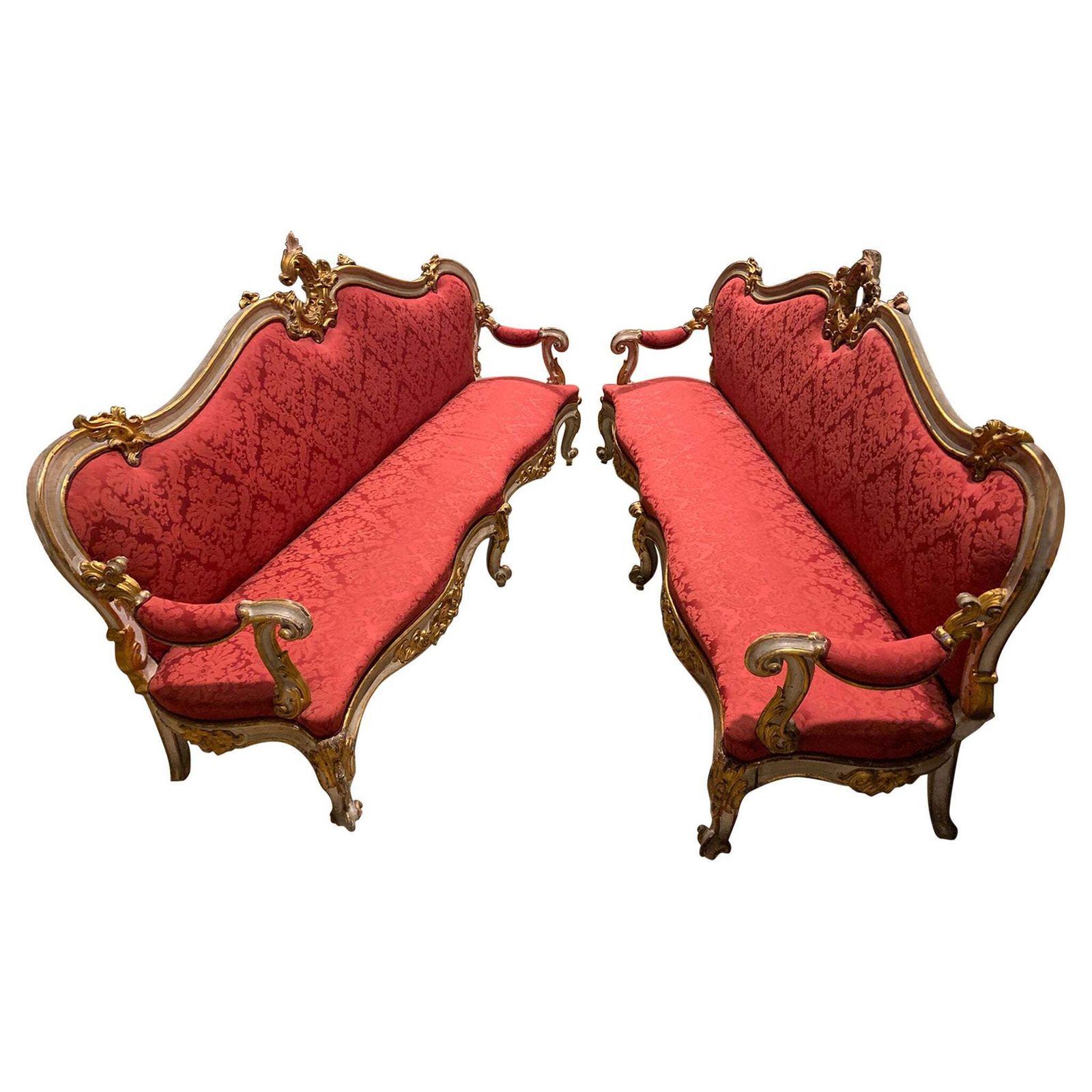 Pair Of Lacquered Gilded Carved Sofas, Upholstered In Red Brocade, Italy