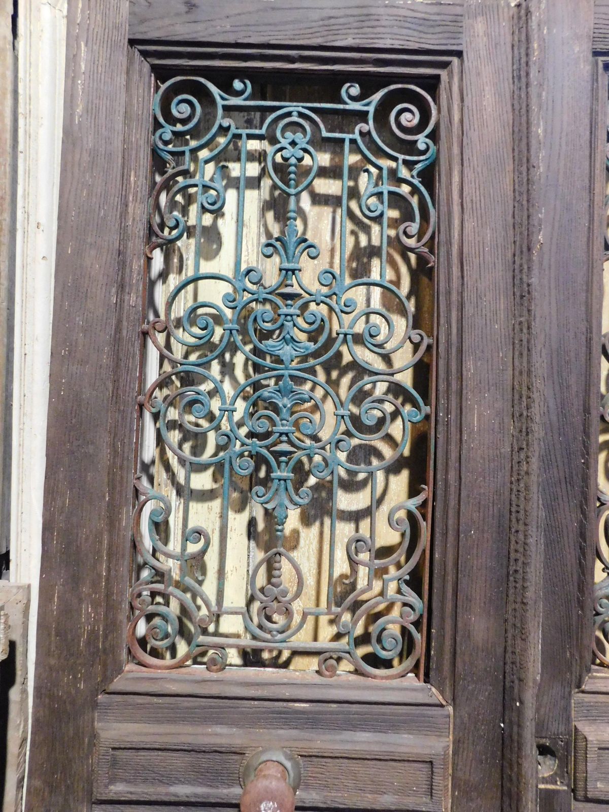 Entrance Door, Main Door In Oak Wood, Two Doors, With Green Iron Grille, Italy photo buy