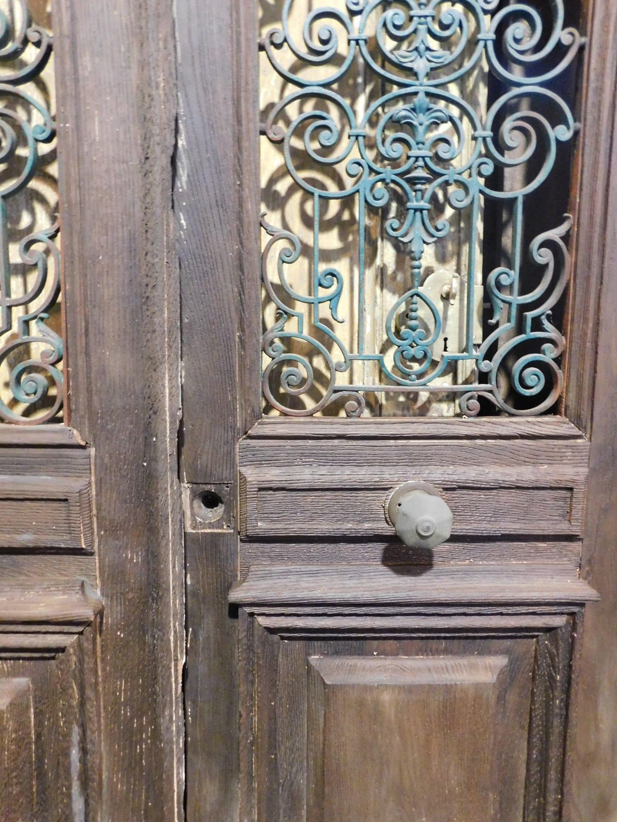 Entrance Door, Main Door In Oak Wood, Two Doors, With Green Iron Grille, Italy photo vintage