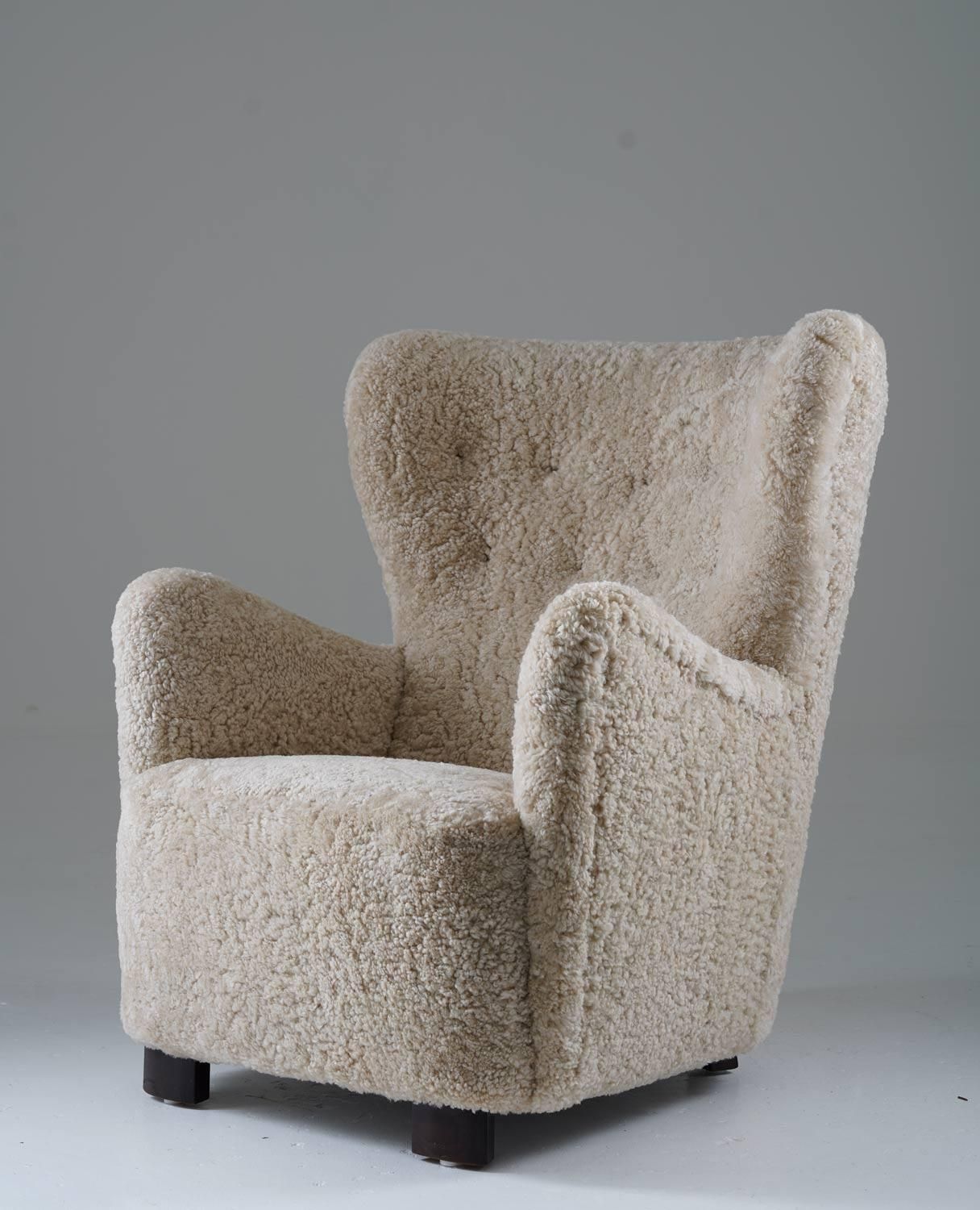Scandinavian Midcentury Lounge Chairs In Sheepskin photo for sale