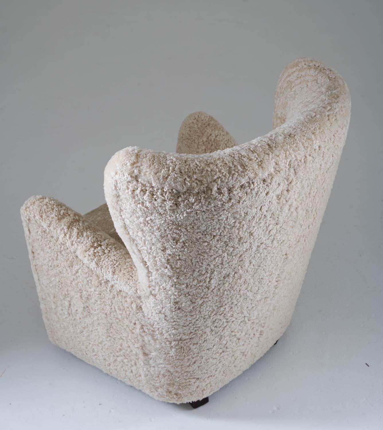 Scandinavian Midcentury Lounge Chairs In Sheepskin photo vinterior