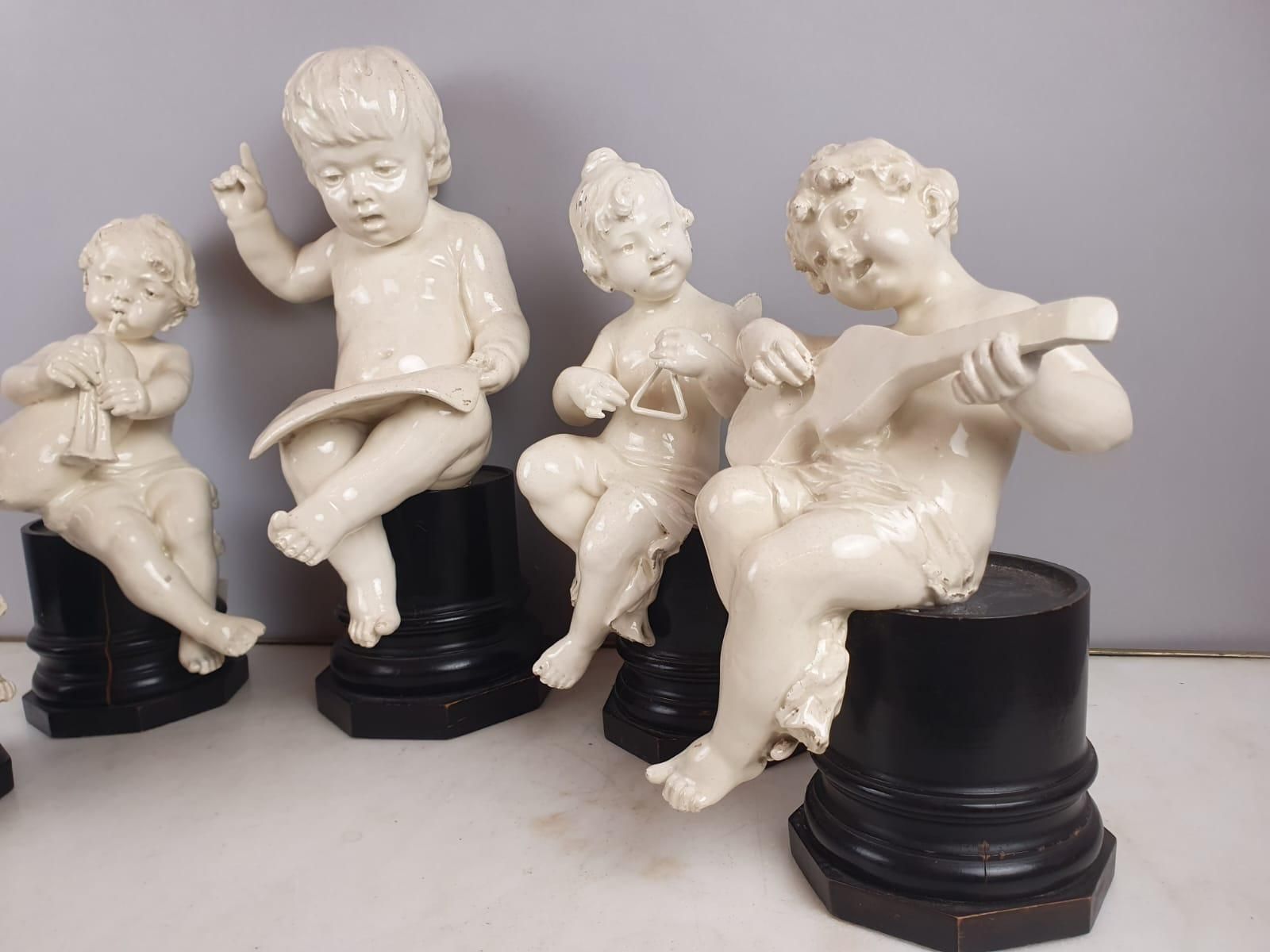 photo for sale Group Of 5 Earthenware Musician Cherubs, Late 19th, Early 20th.