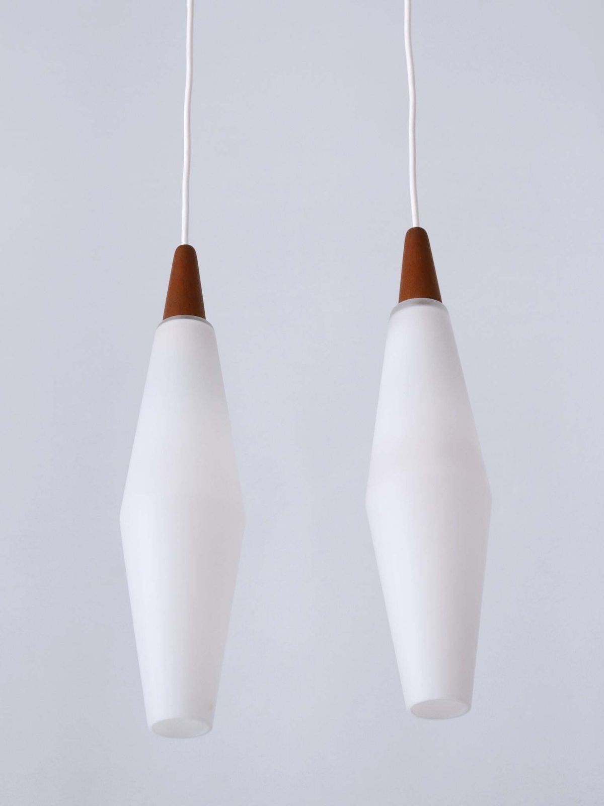 photo vintage Set Of Two Elegant Scandinavian Opaline Glass & Teak Pendant Lamps 1960s
