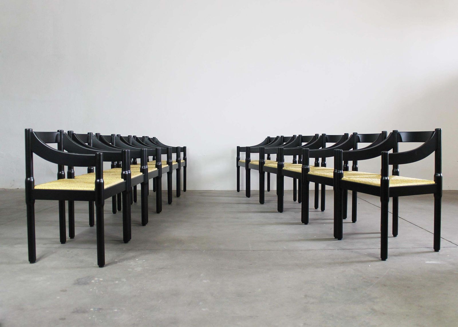 Vico Magistretti Set Of Twelve Black Carimate Chairs By Cassina 1960s photo for sale