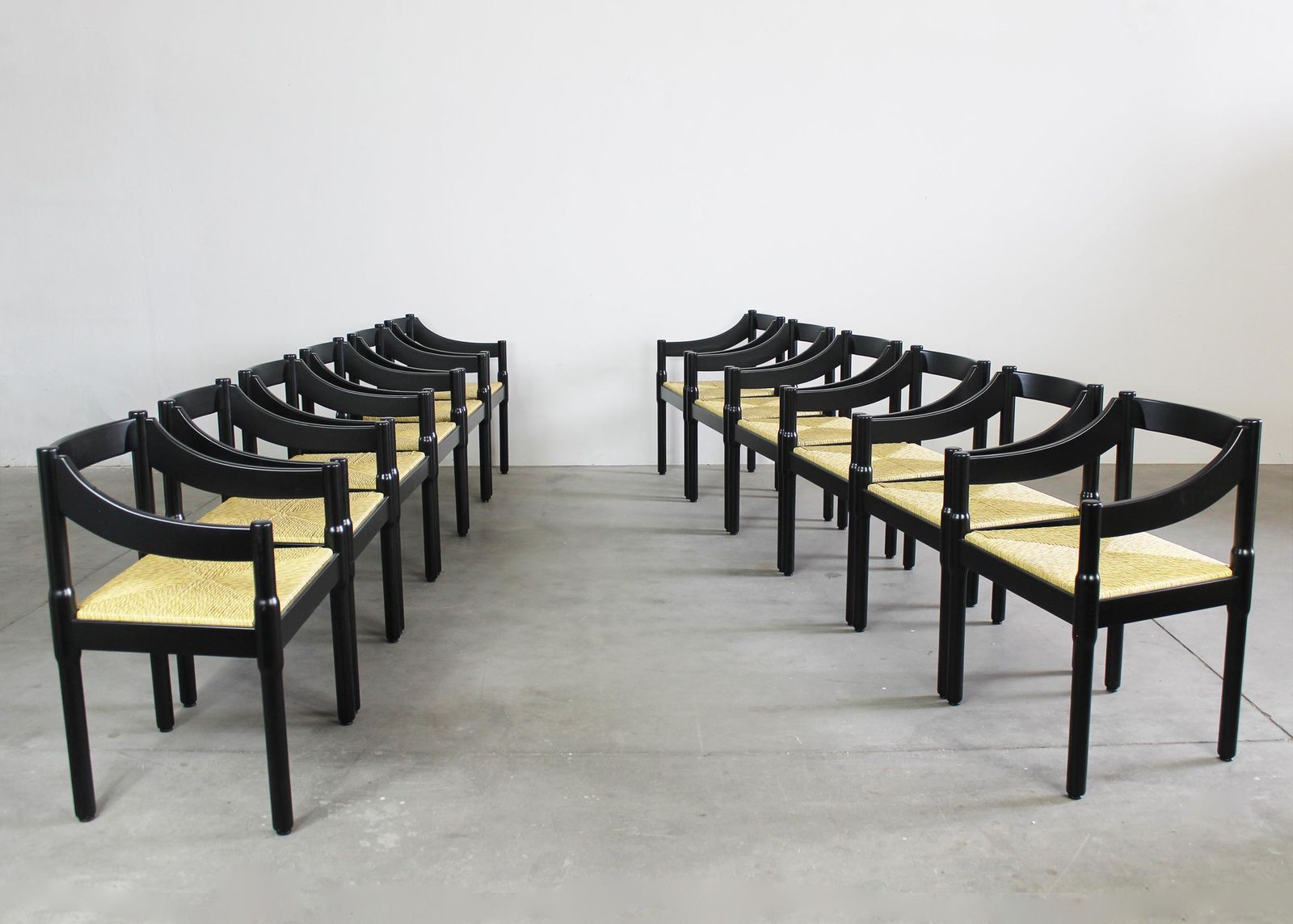 Vico Magistretti Set Of Twelve Black Carimate Chairs By Cassina 1960s photo Furniture