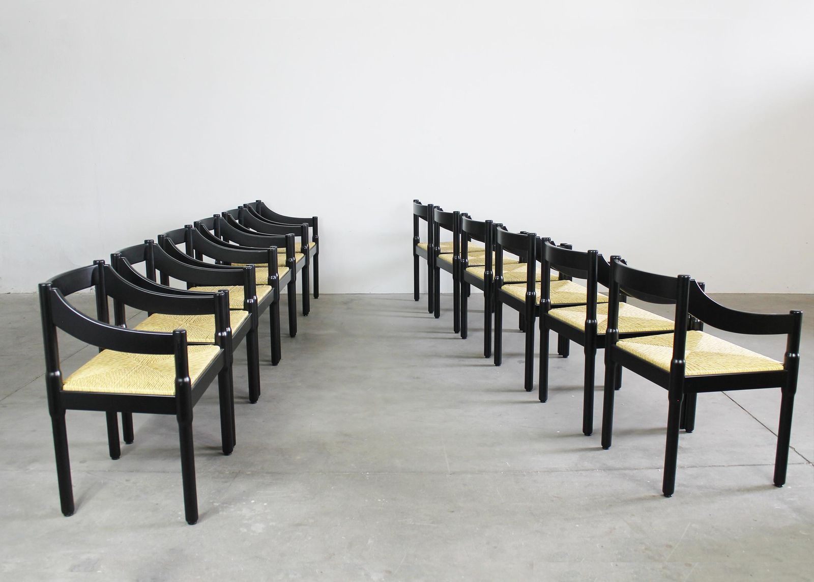 Vico Magistretti Set Of Twelve Black Carimate Chairs By Cassina 1960s photo vinterior