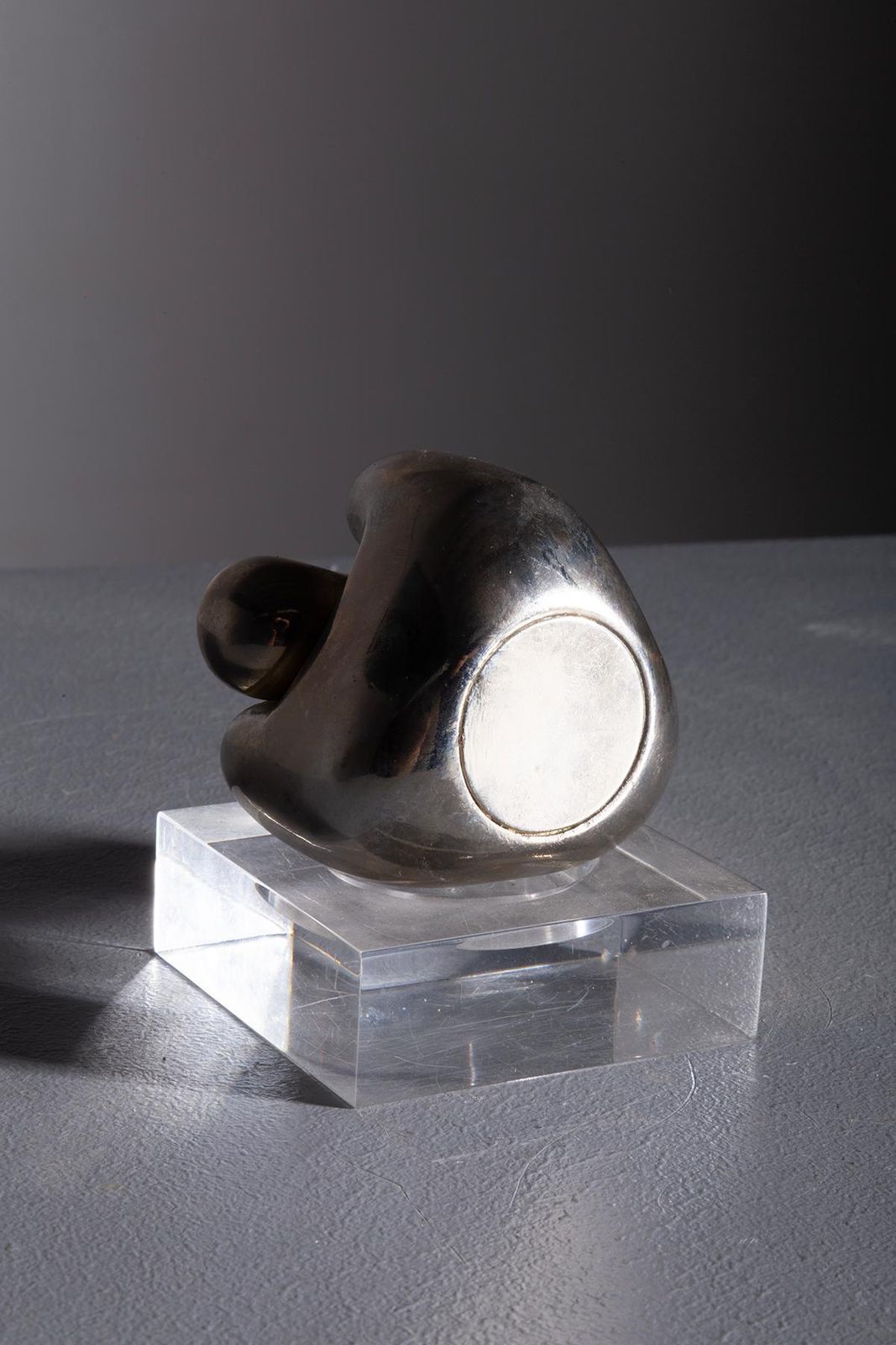 Small Organic Sculpture Made Of Chrome Plated Metal photo furniture