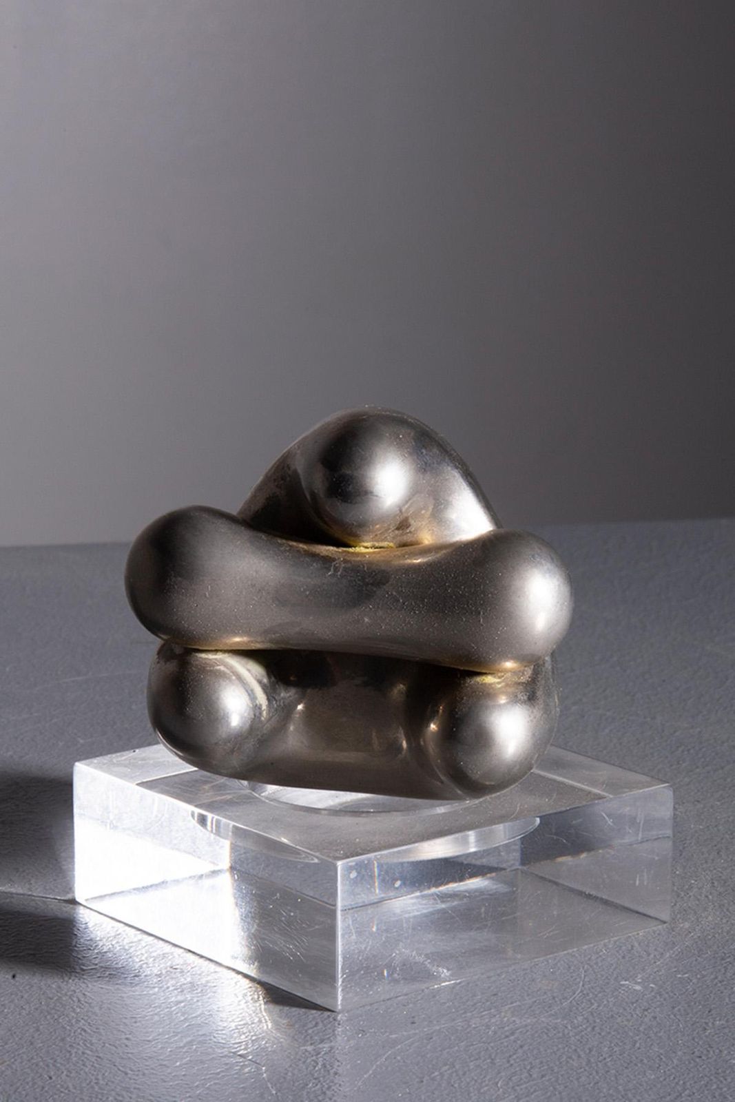 Small Organic Sculpture Made Of Chrome Plated Metal photo vinterior