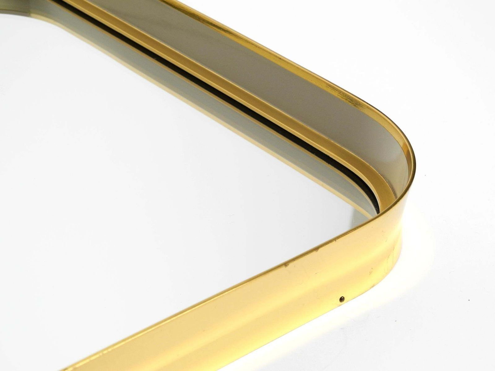 photo furniture Mid Century Modern Wall Mirror With Heavy Brass Frame By Münchener Zierspiegel