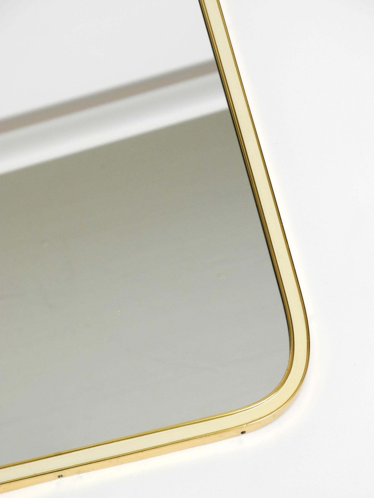 photo vinterior Large Heavy Long Mid Century Brass Wall Mirror By Münchner Zierspiegel
