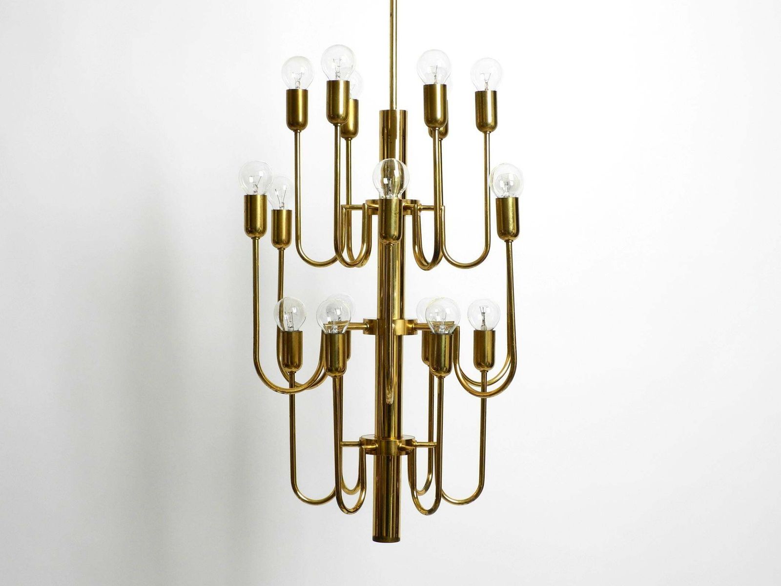 Beautiful Three Staged 18 Arm Mid Century Brass Chandelier With A Long Brass Rod photo for sale