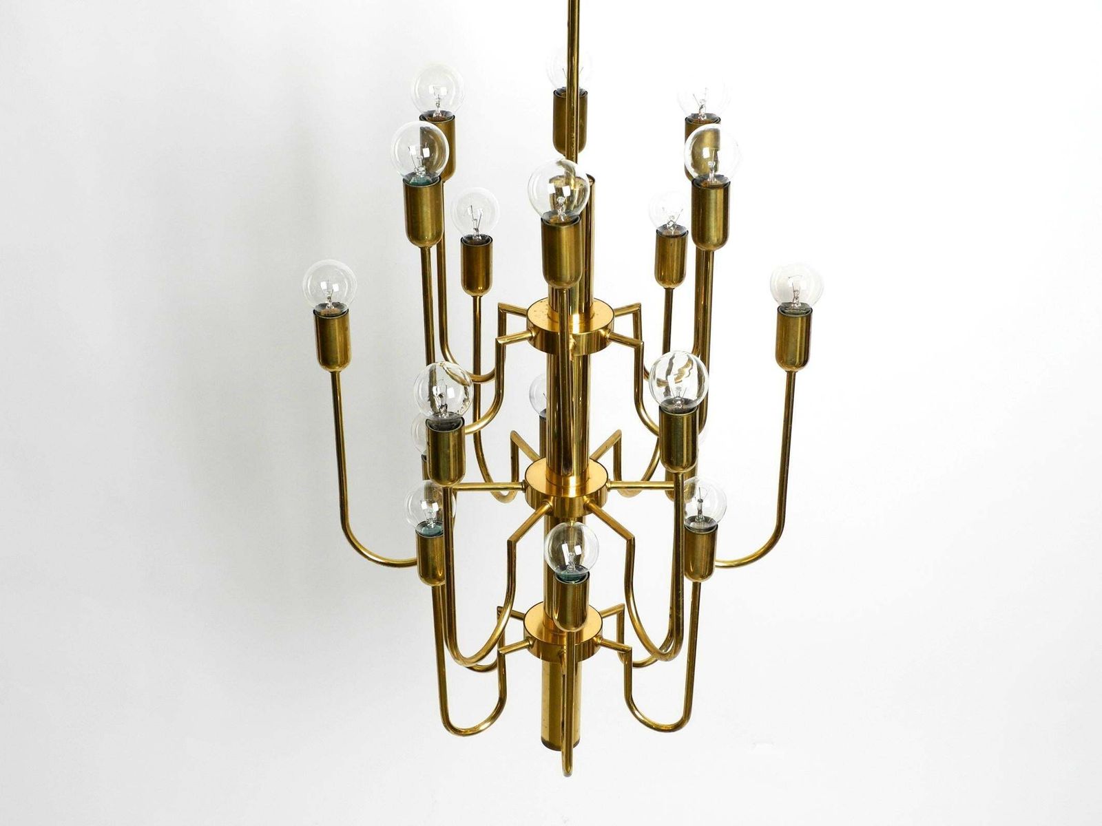 2574.0 Beautiful Three Staged 18 Arm Mid Century Brass Chandelier With A Long Brass Rod photo