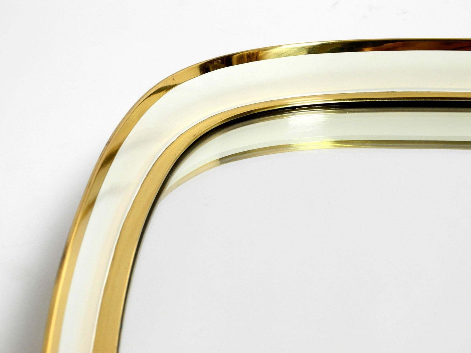 photo vintage Huge Mid Century Modern "Zier Form" Wall Mirror With Heavy Brass Frame