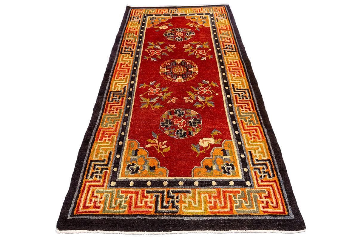 Tibetan Rug Red Field Spiritual Symbolism photo Textiles