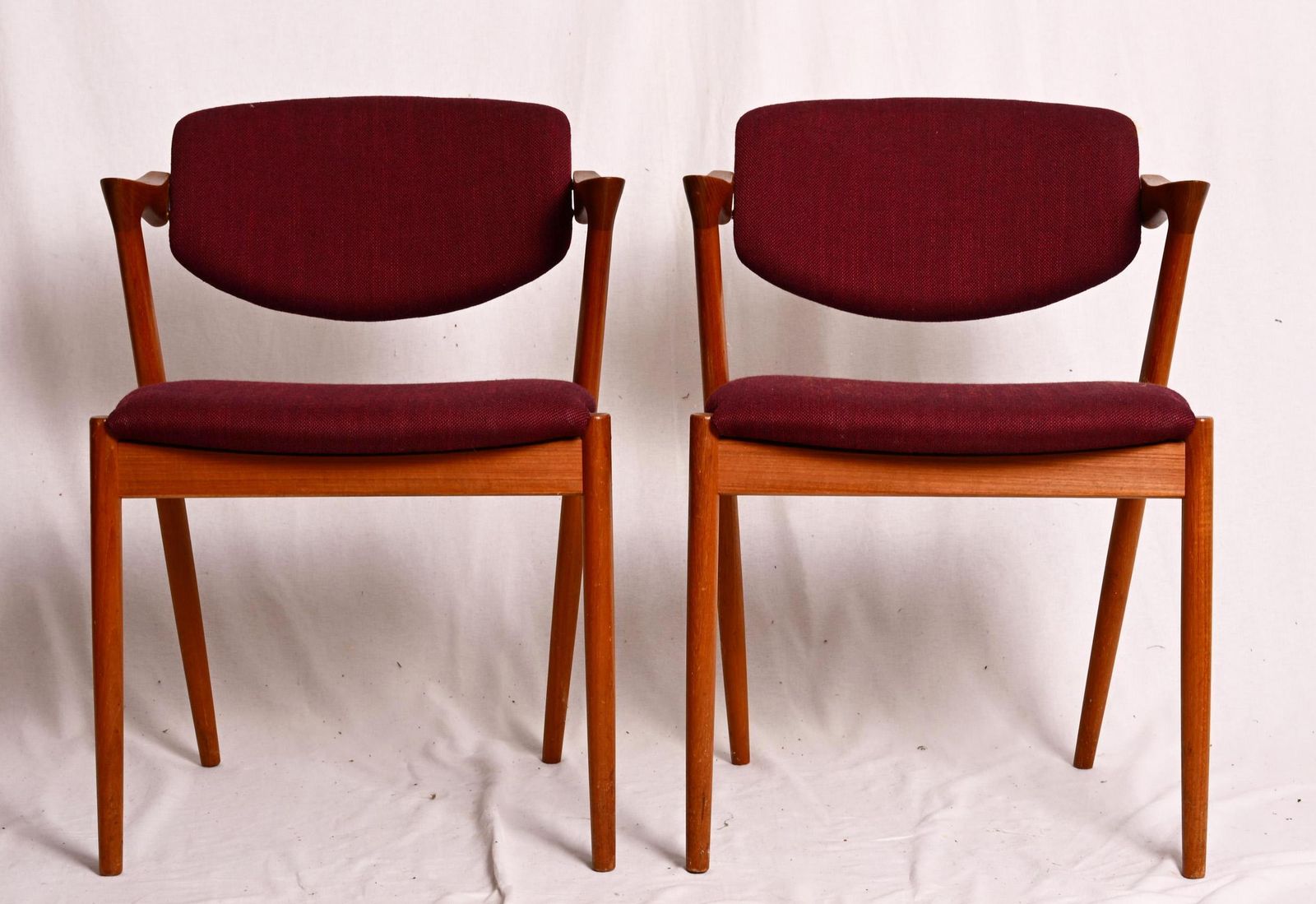 A Pair Of Teak Dining Chairs By Kai Kristiansen Model 42 photo buy