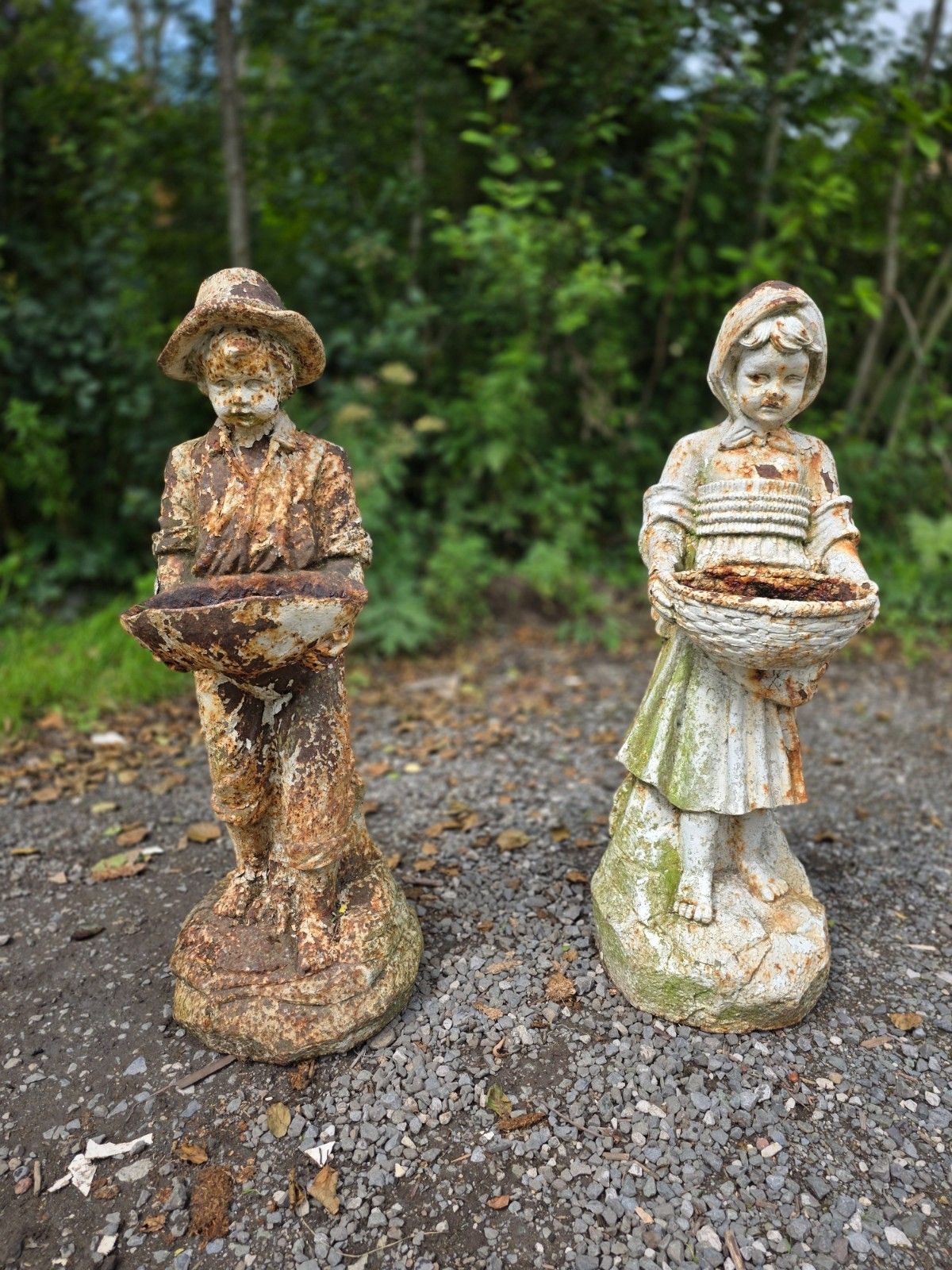 Pair Of Early 20th Century Cast Iron Boy And Girl Statues