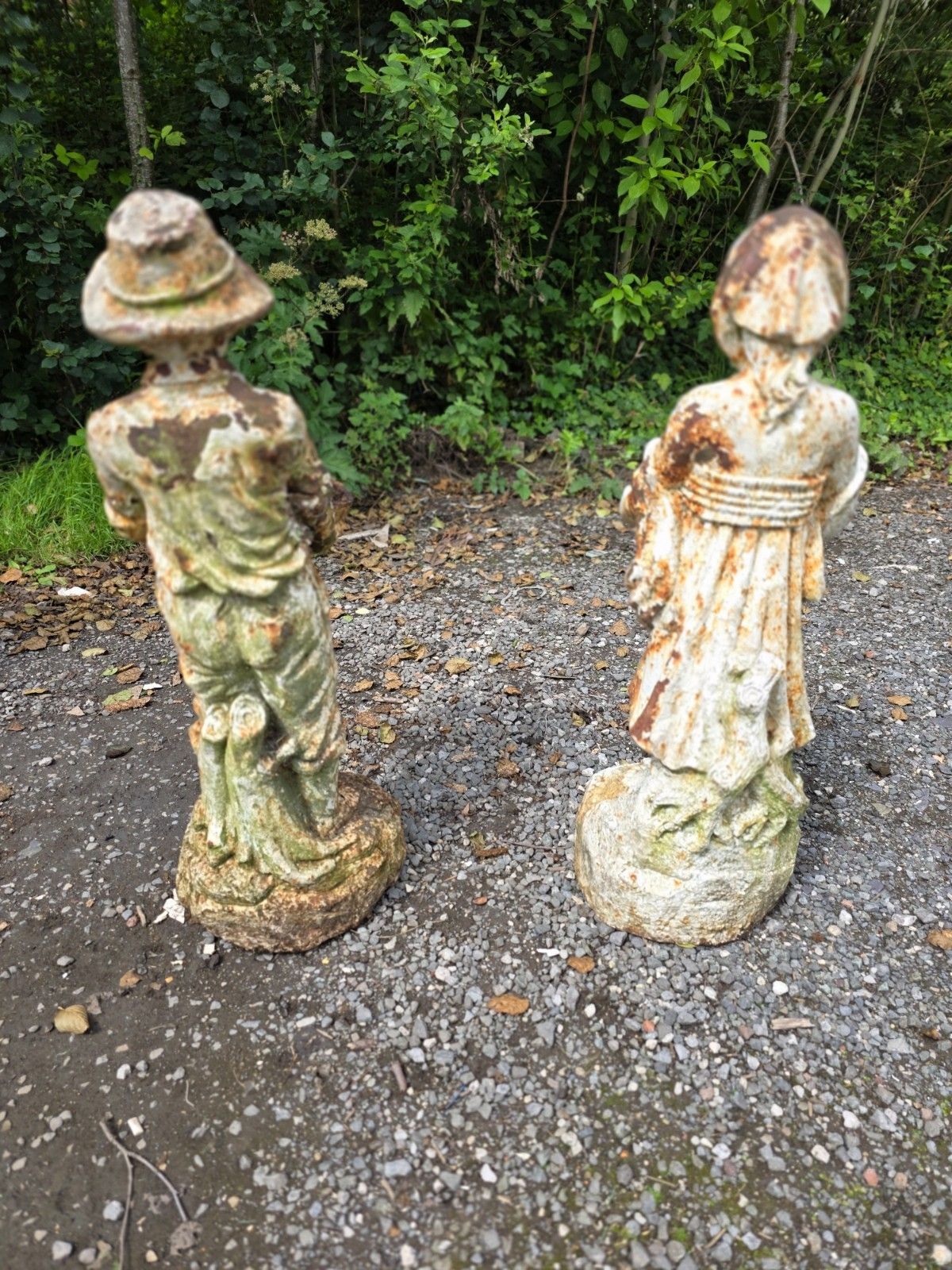 photo furniture Pair Of Early 20th Century Cast Iron Boy And Girl Statues