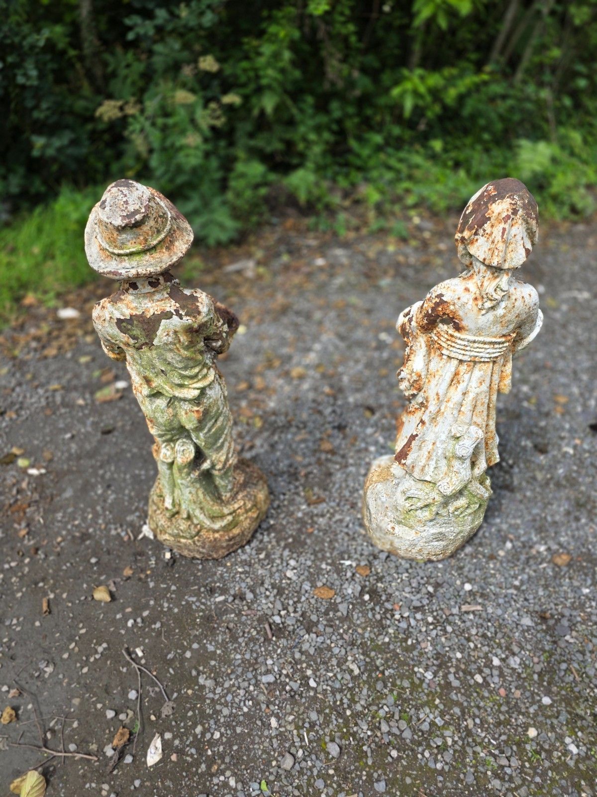 photo for sale Pair Of Early 20th Century Cast Iron Boy And Girl Statues
