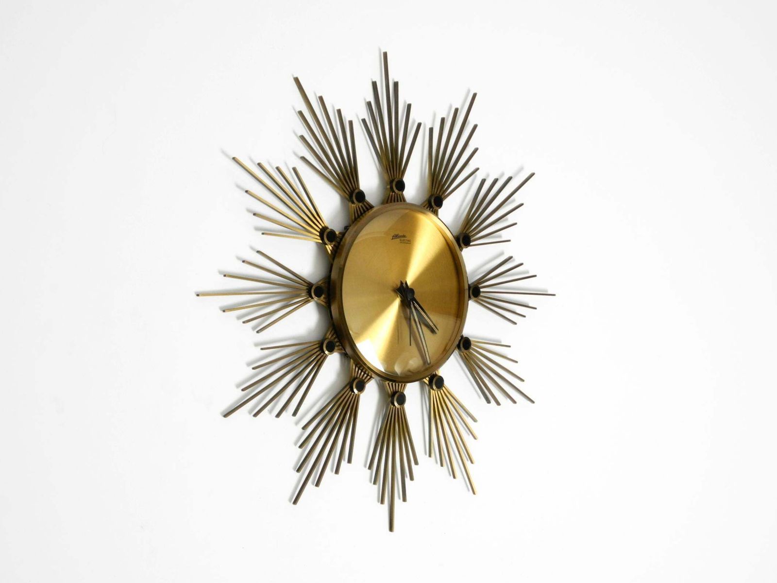 Original 1950s Sunburst Wall Clock By Atlanta Made Of Brass And Battery Operated photo furniture