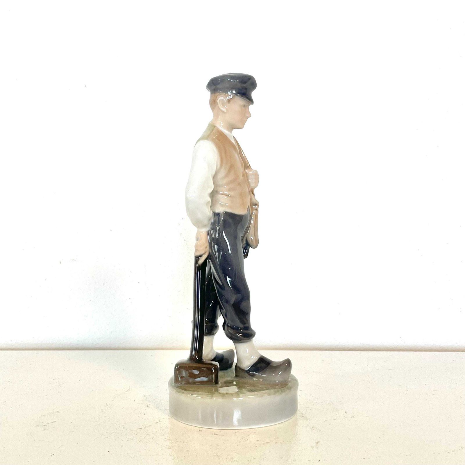 Royal Copenhagen Porcelain Figurine Of Boy Sentry With Hammet In Exquisite Glaze Designed By Christian Thomsen In 1904 photo vintage