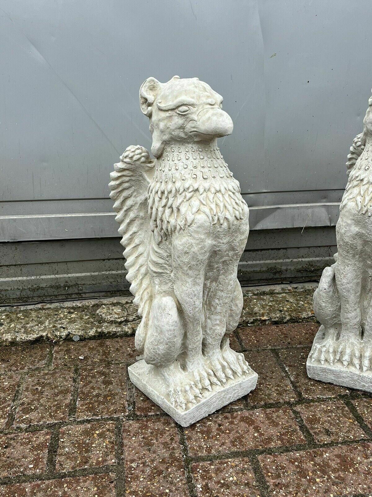 Pair Of Griffins. Perfect For Pier Cap Decoration Or Use A Statues photo Art