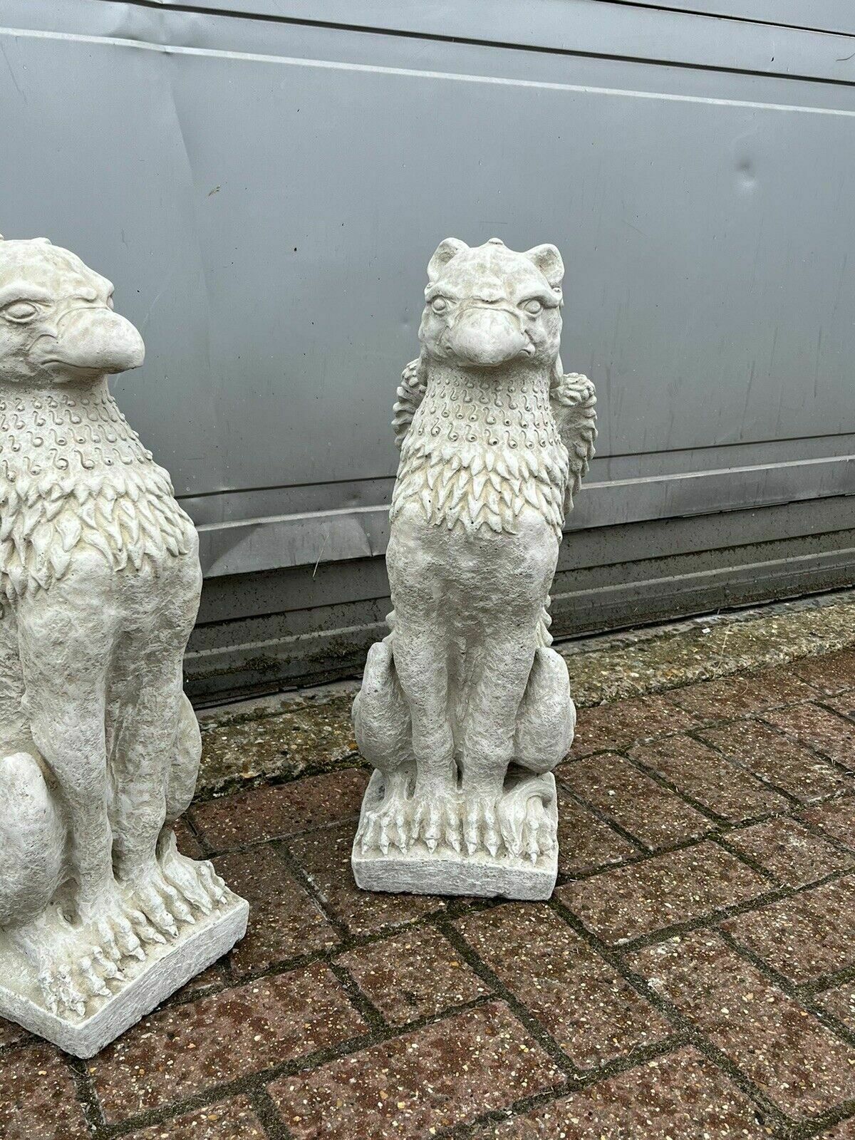 Pair Of Griffins. Perfect For Pier Cap Decoration Or Use A Statues photo vinterior