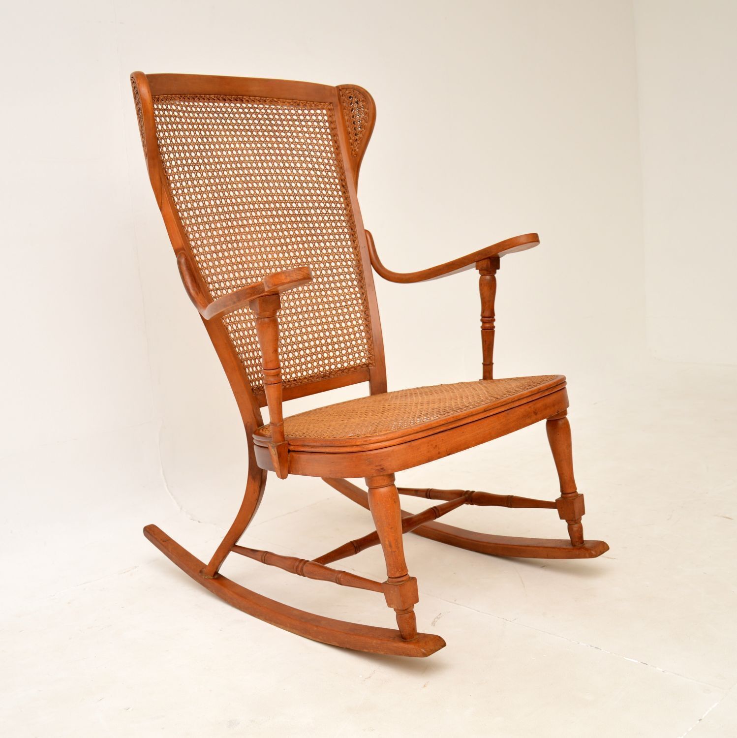Antique Bentwood Cane Rocking Chair photo 514.0