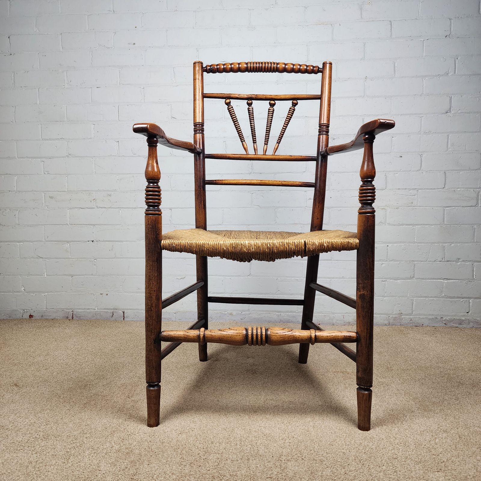 A George III Elm And Fruitwood Spindle Back Carver Chair photo furniture