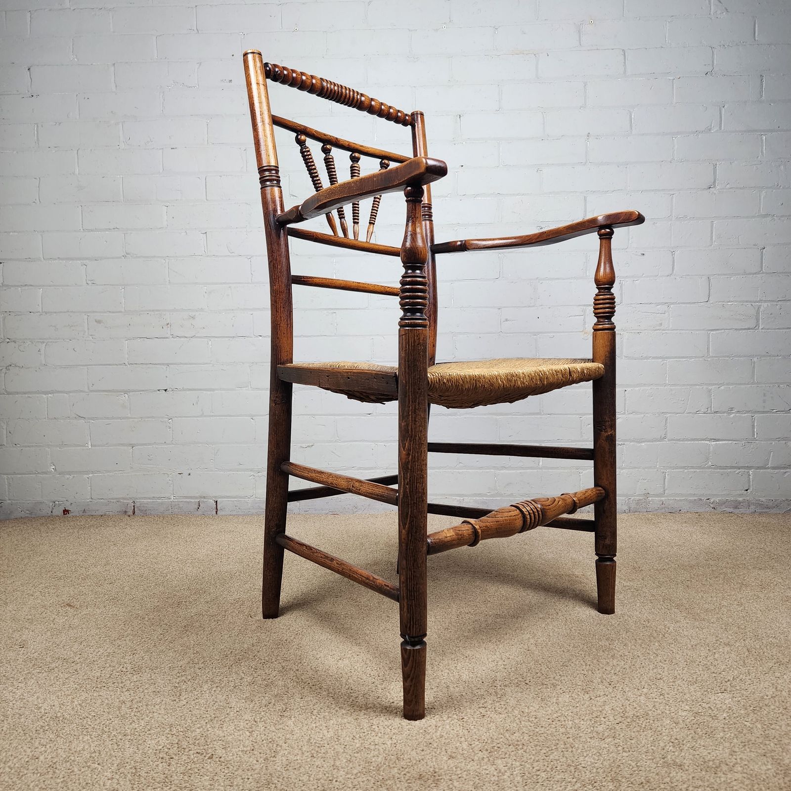 A George III Elm And Fruitwood Spindle Back Carver Chair photo for sale