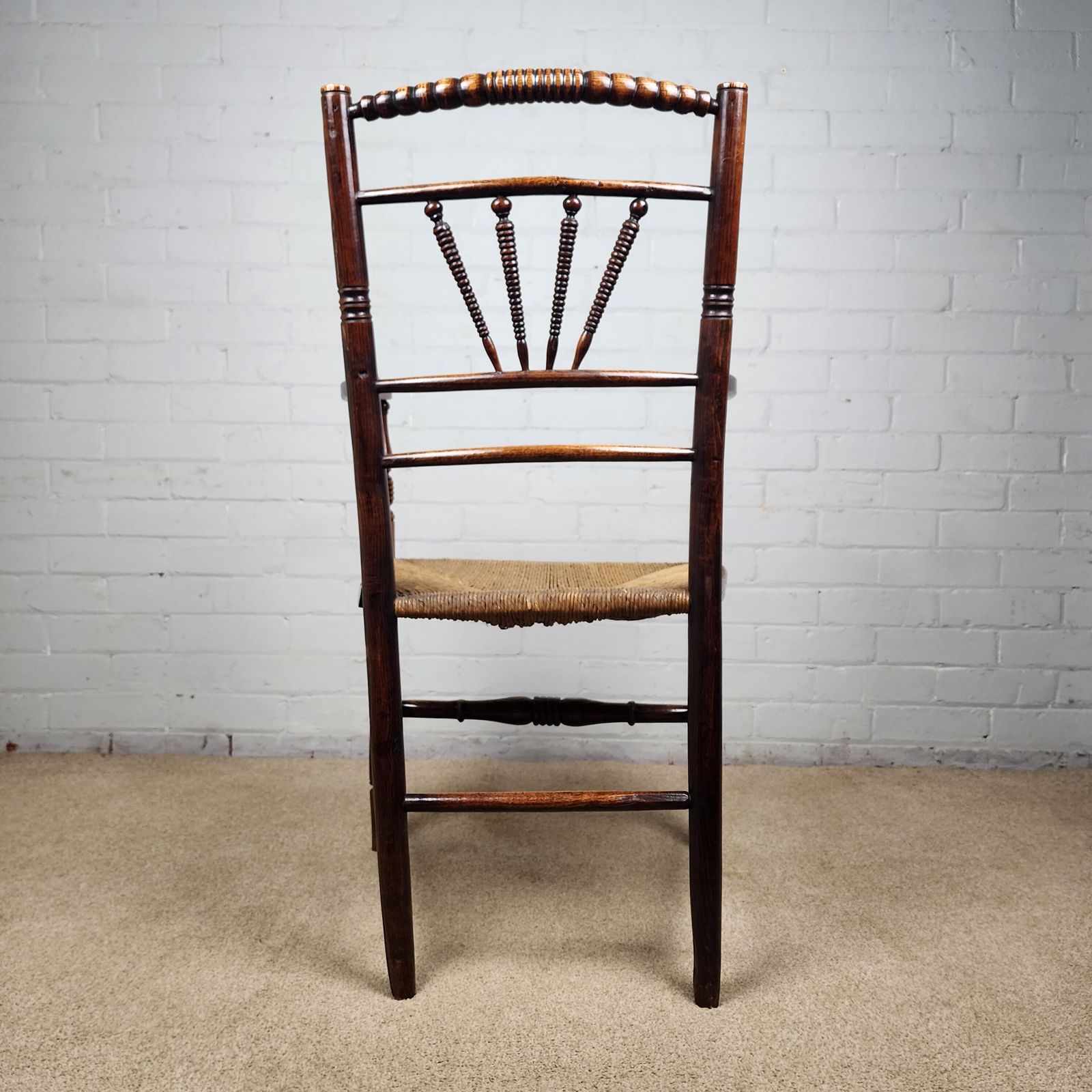 A George III Elm And Fruitwood Spindle Back Carver Chair photo vinterior