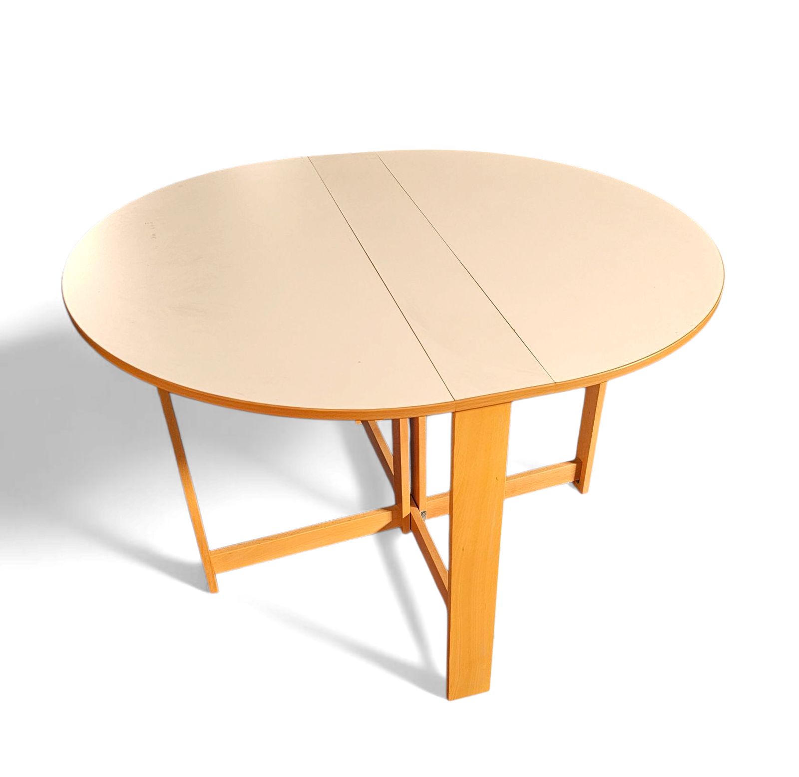 Vintage Scandinavian Folding Dining Table With Side Leaves. The Oval Top Is Made Of White Formica photo 850.0