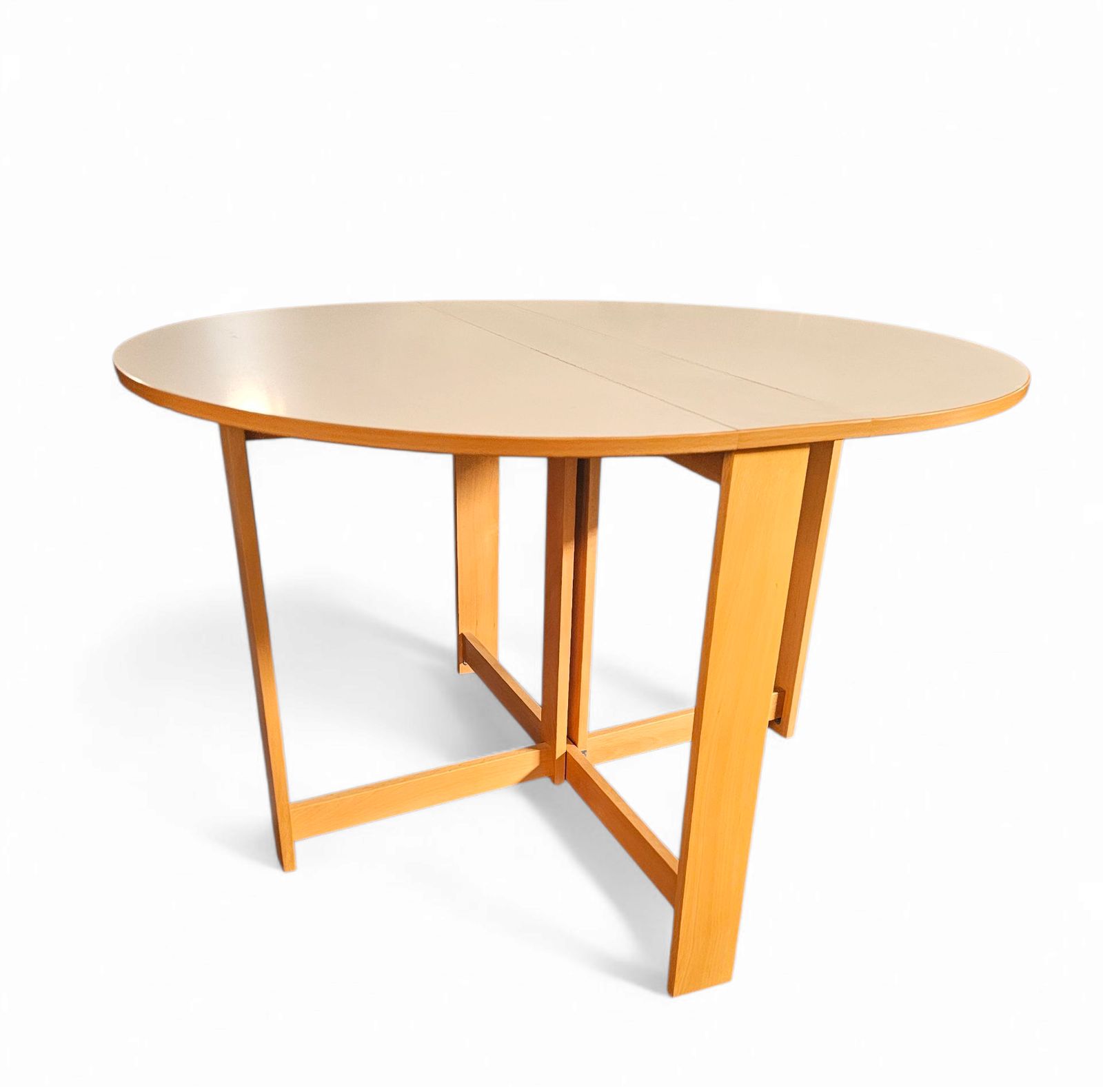 850.0 Vintage Scandinavian Folding Dining Table With Side Leaves. The Oval Top Is Made Of White Formica photo