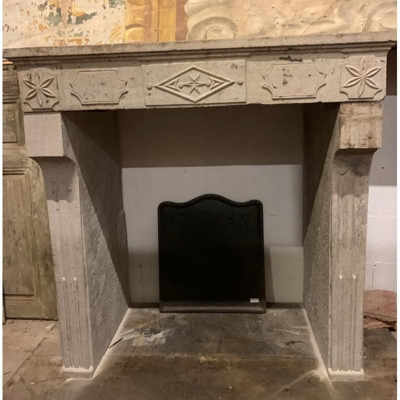 Fireplace Mantel Carved In Grey Stone With Decorations, France photo furniture