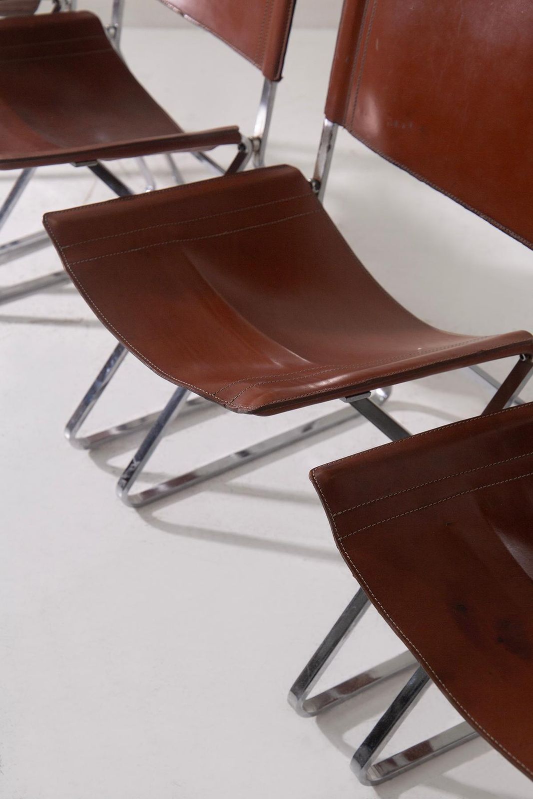 photo furniture Set Of Four Leather Chairs Attr. To Pierre Paulin And Steel